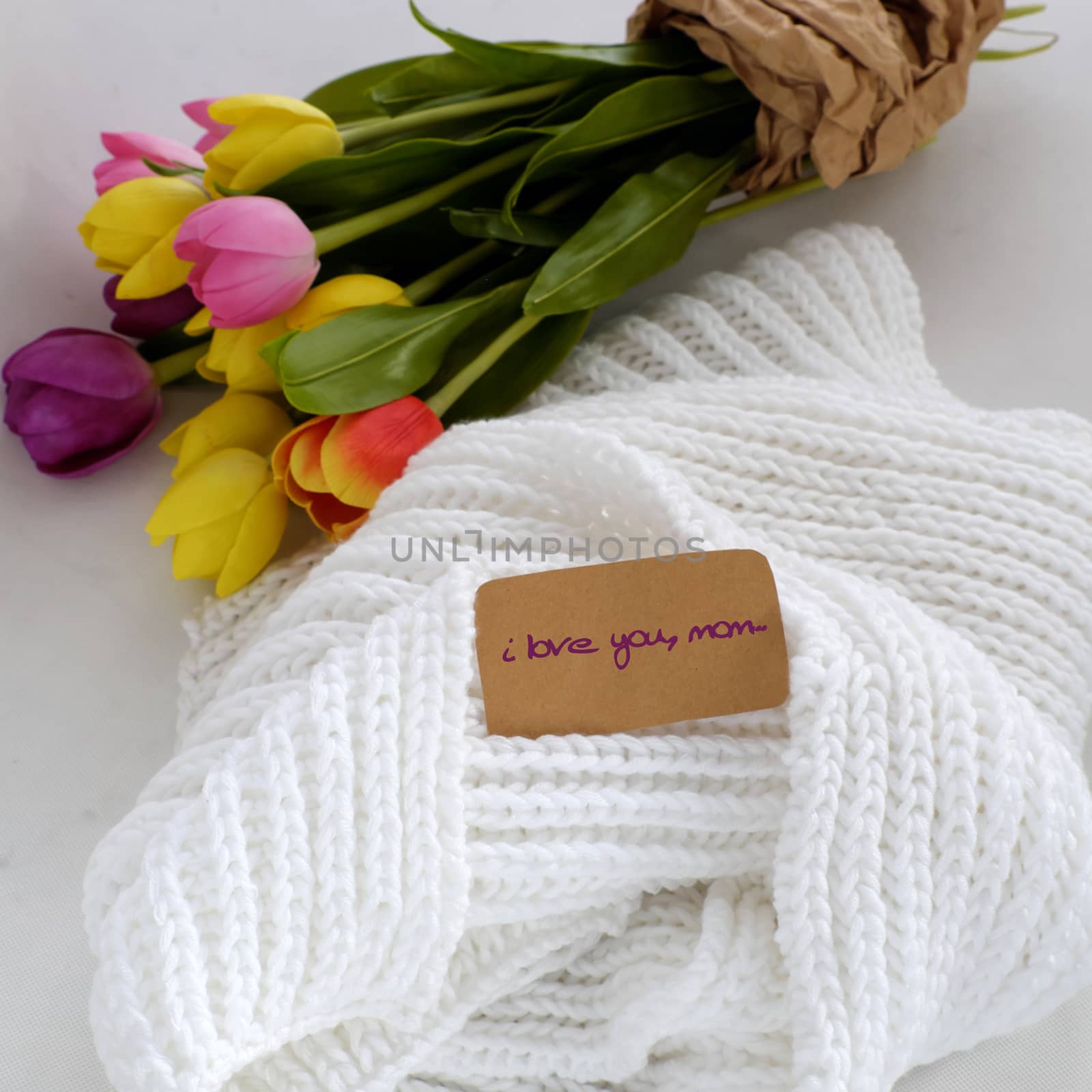 Happy mother day with meaningful handmade gift include knitted white scarf and tulip flower bouquet from clay, gratitude and thank mom for love in special day