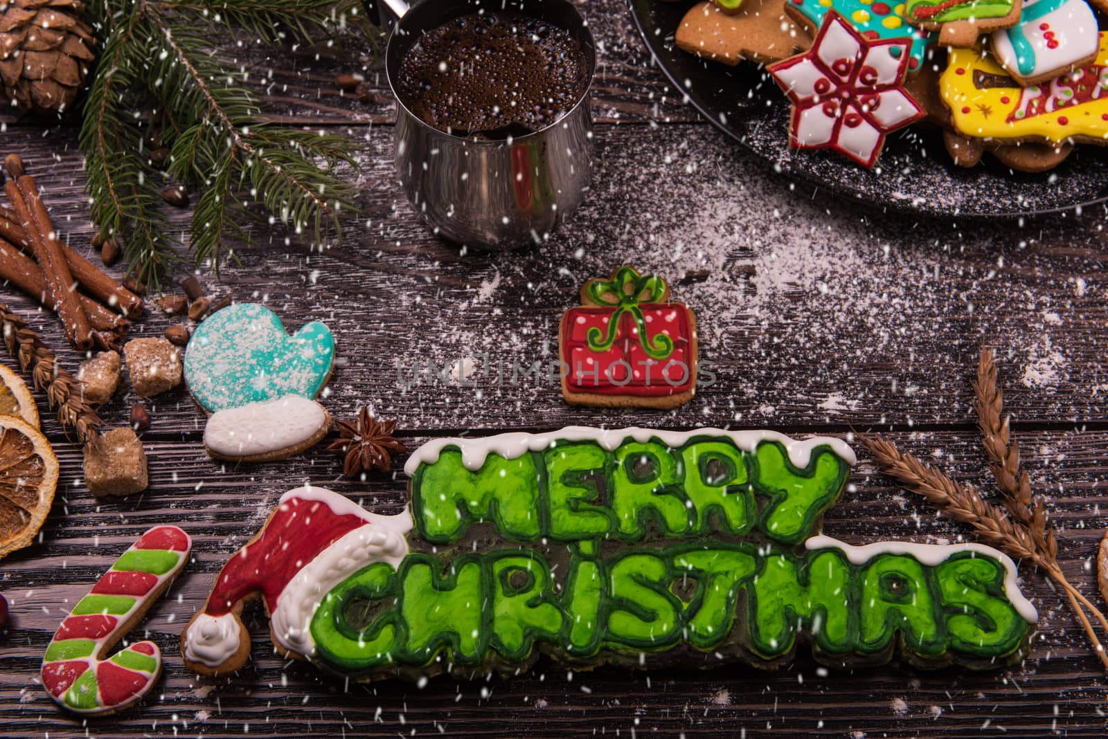 Different ginger cookies and coffee for new years and christmas on wooden background, xmas theme. Top view.