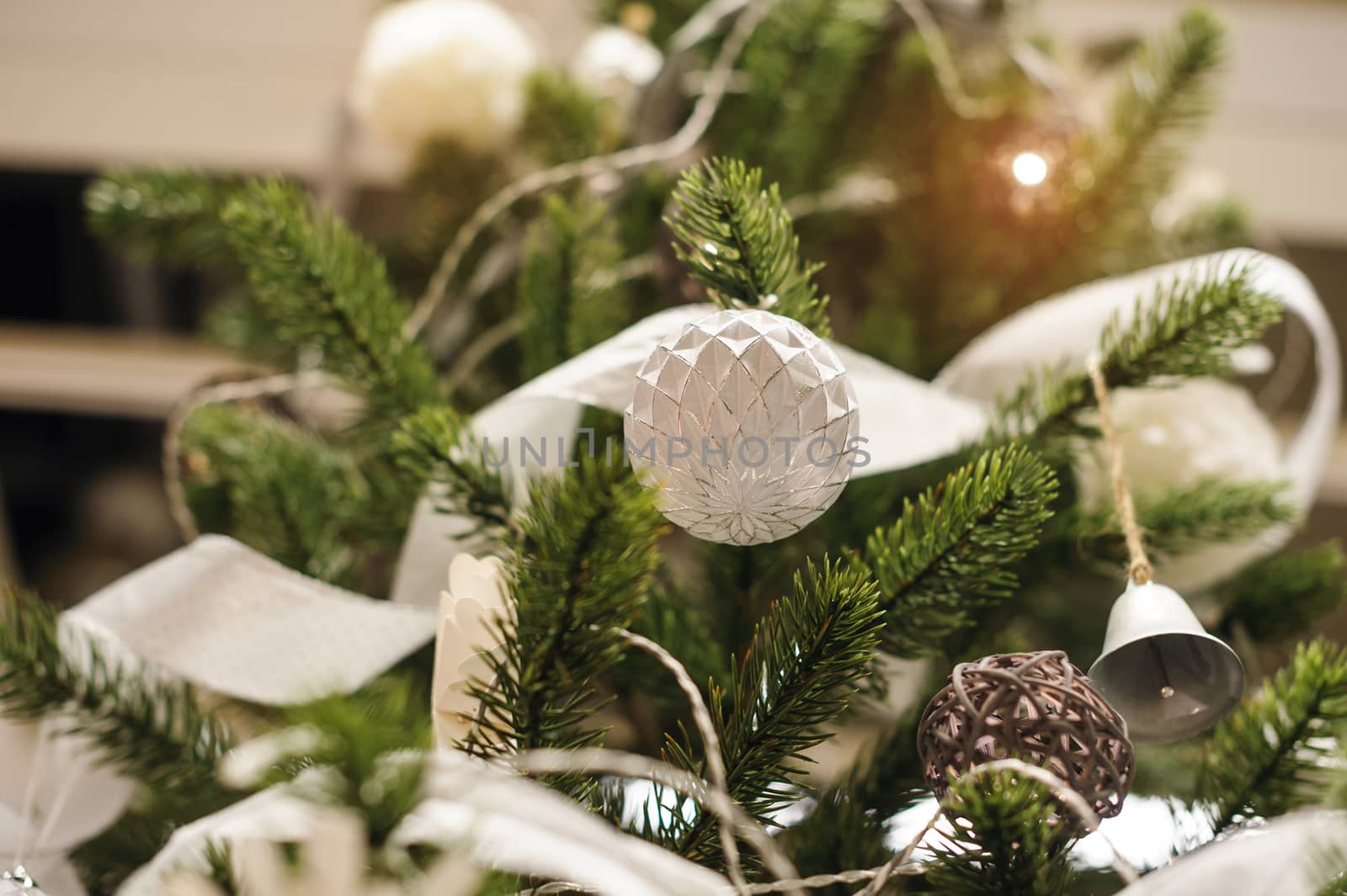 Beautiful Christmas toys on fir tree in the Park.