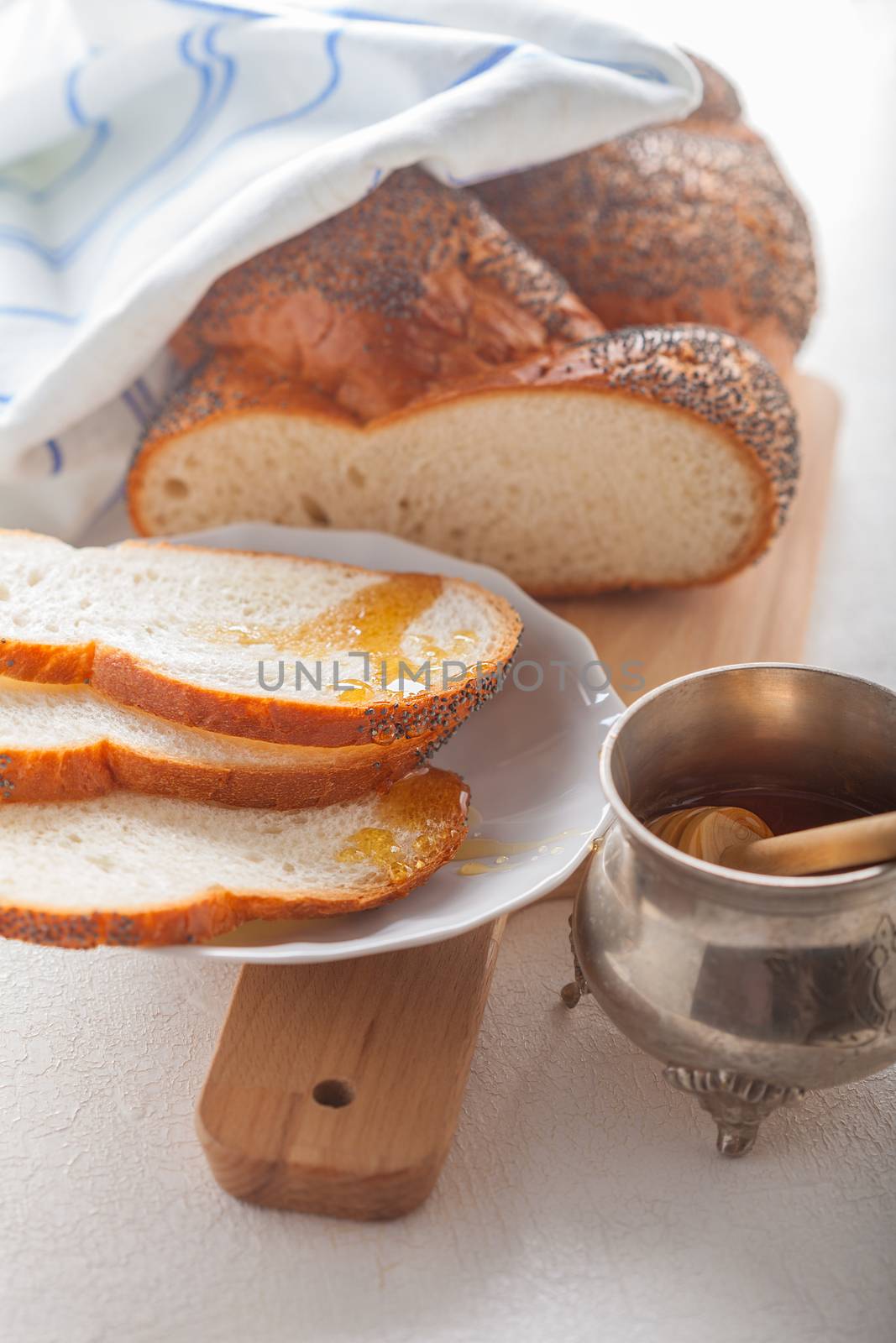 Braided Challah bread and honey for Rosh Hashana