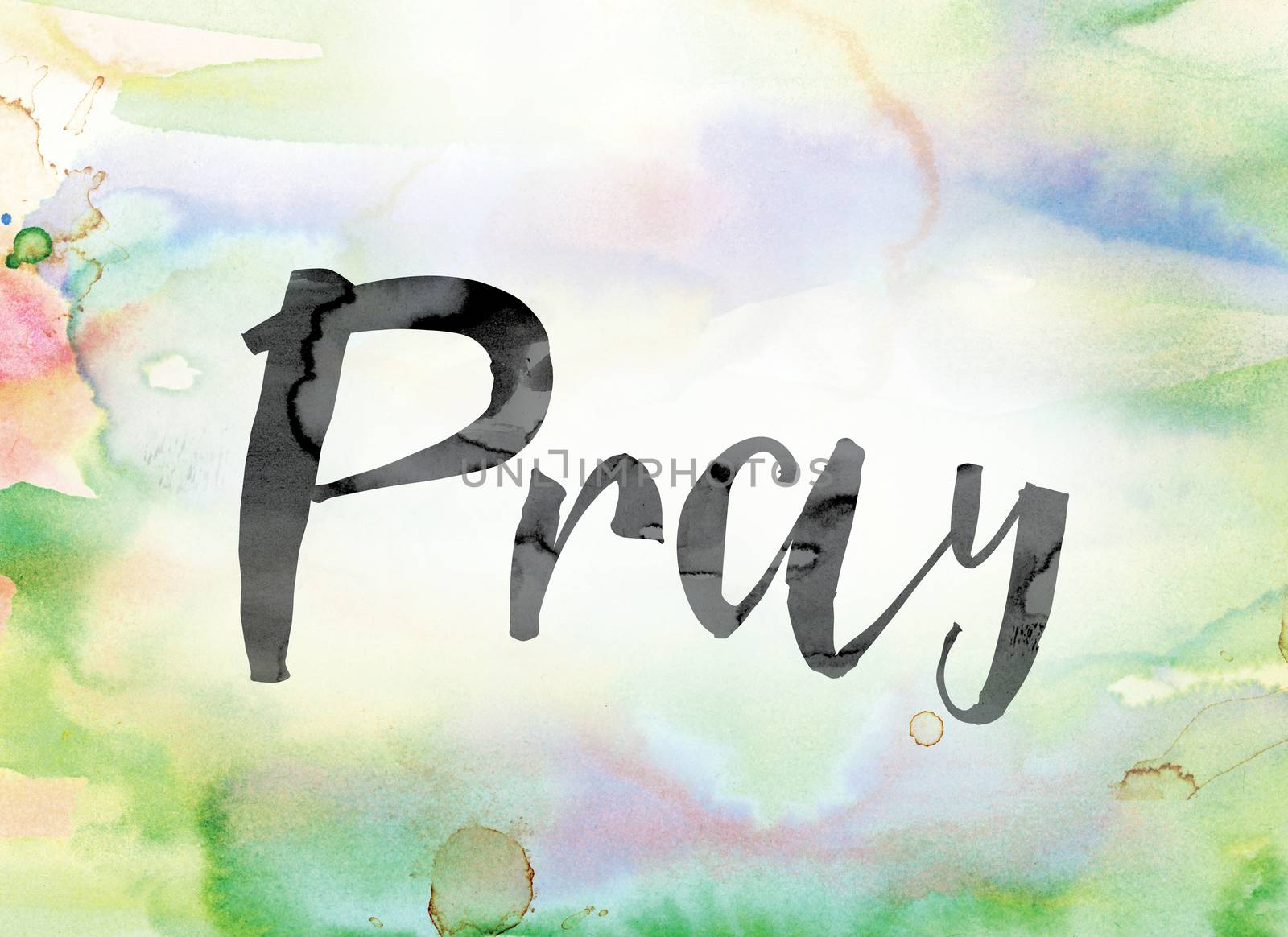 The word "Pray" painted in black ink over a colorful watercolor washed background concept and theme.