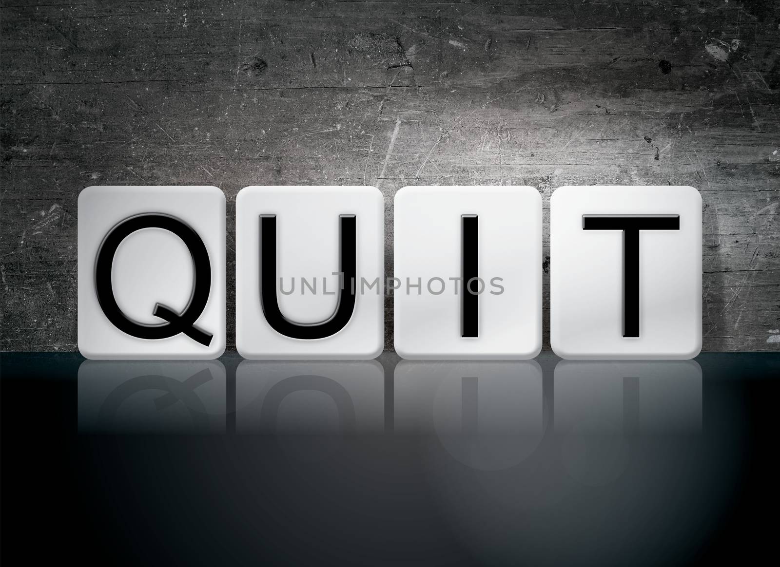 The word "Quit" written in white tiles against a dark vintage grunge background.