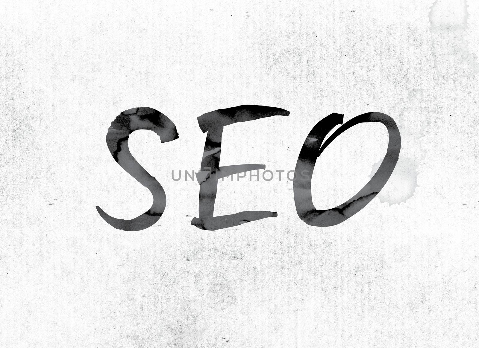 The word "SEO" concept and theme painted in watercolor ink on a white paper.