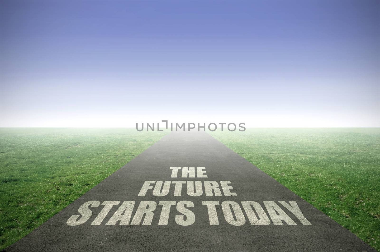 The future starts today painted on an open road leading out to the horizon