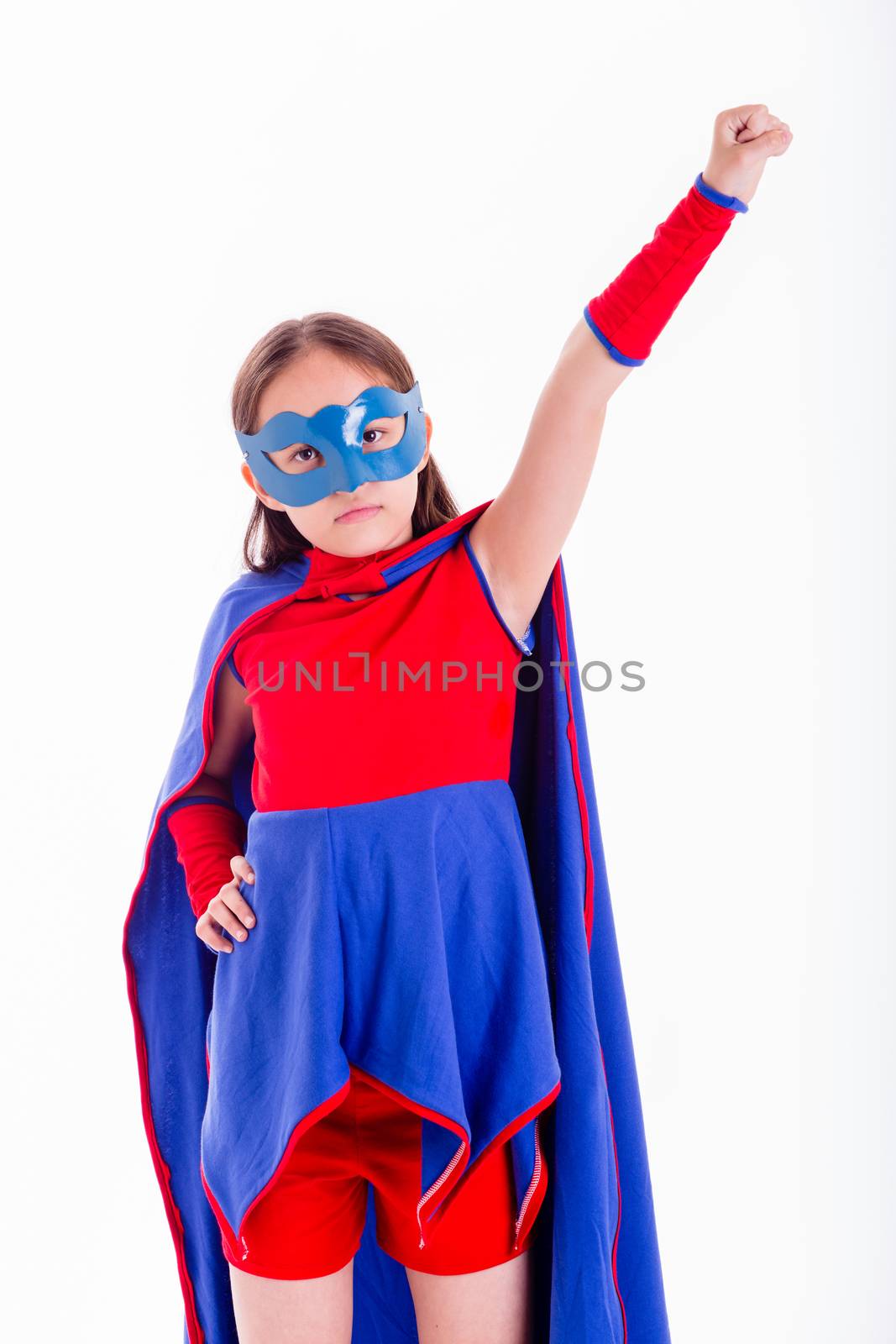 Girl in blue and red superhero costume with hand stretched out to fly