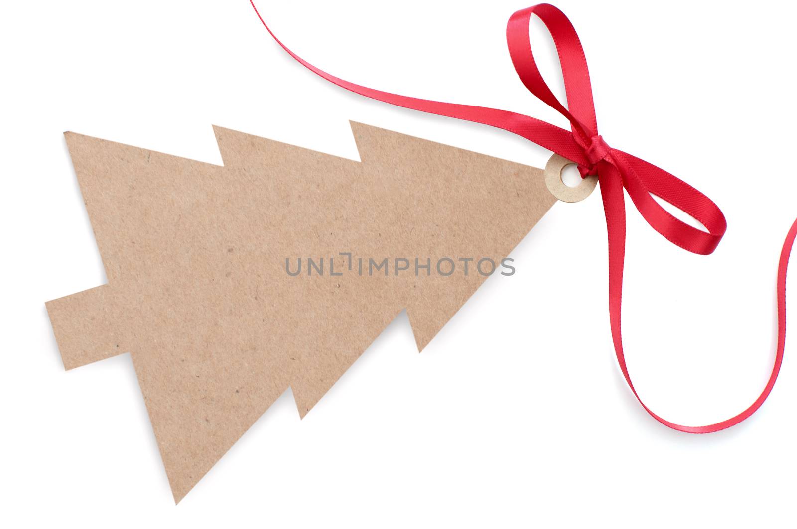 Blank christmas tree gift label with a red satin ribbon bow 