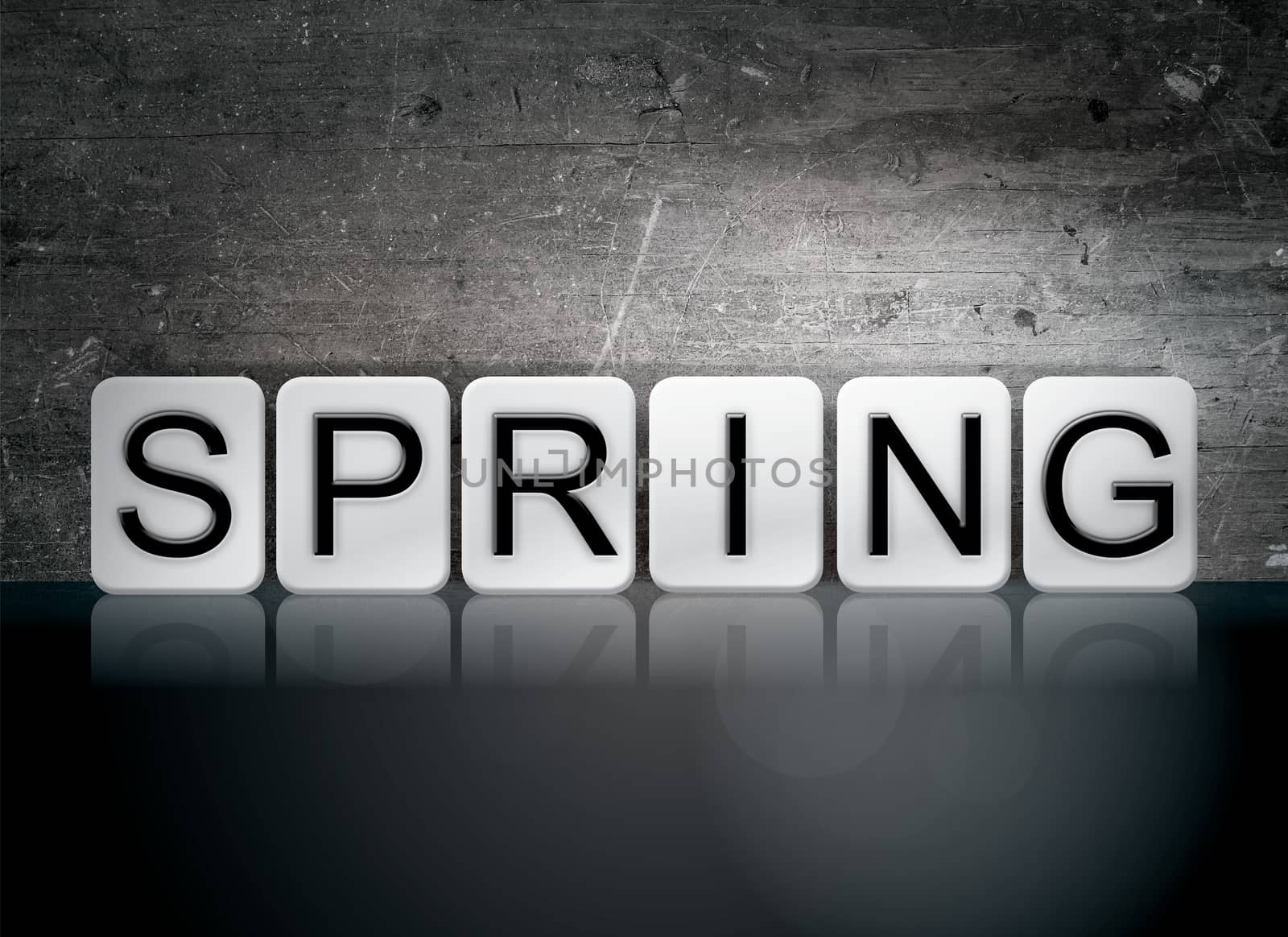 The word "Spring" written in white tiles against a dark vintage grunge background.