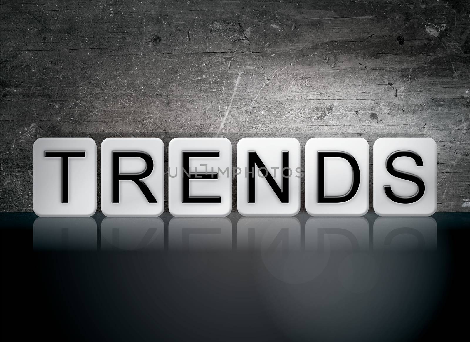 The word "Trends" written in white tiles against a dark vintage grunge background.