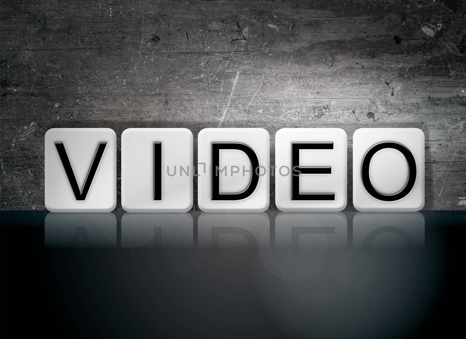 The word "Video" written in white tiles against a dark vintage grunge background.