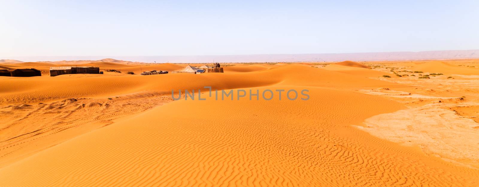 nomad tents in the Sahara with solar panels