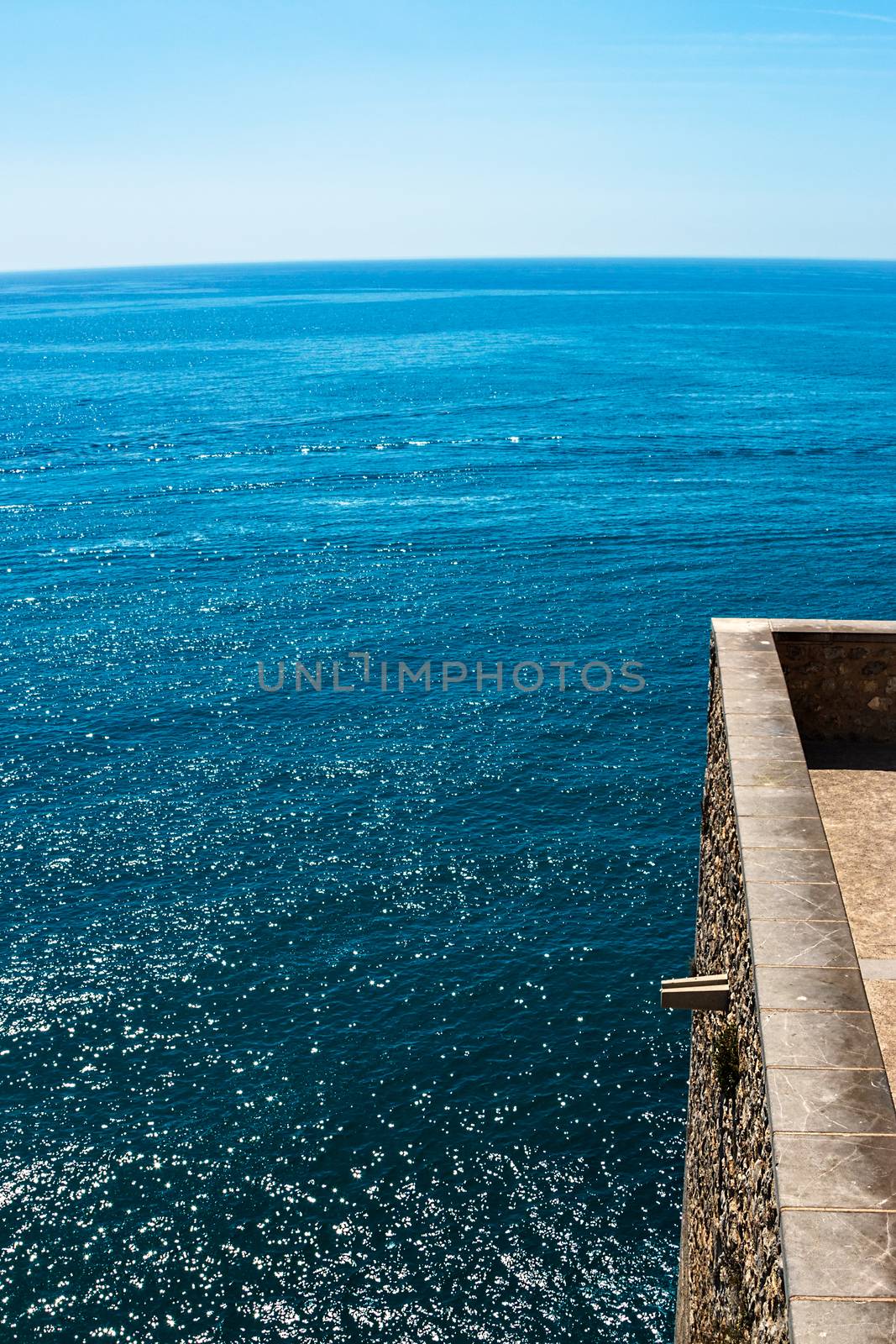 Terrace to contemplate the sea. Vertical image.