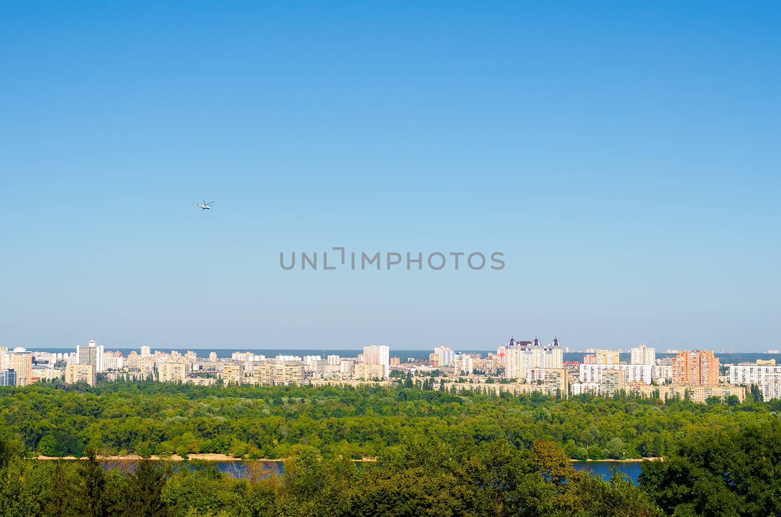 Helicopter flying above the Kiev city. Kiev is the capital of Ukraine