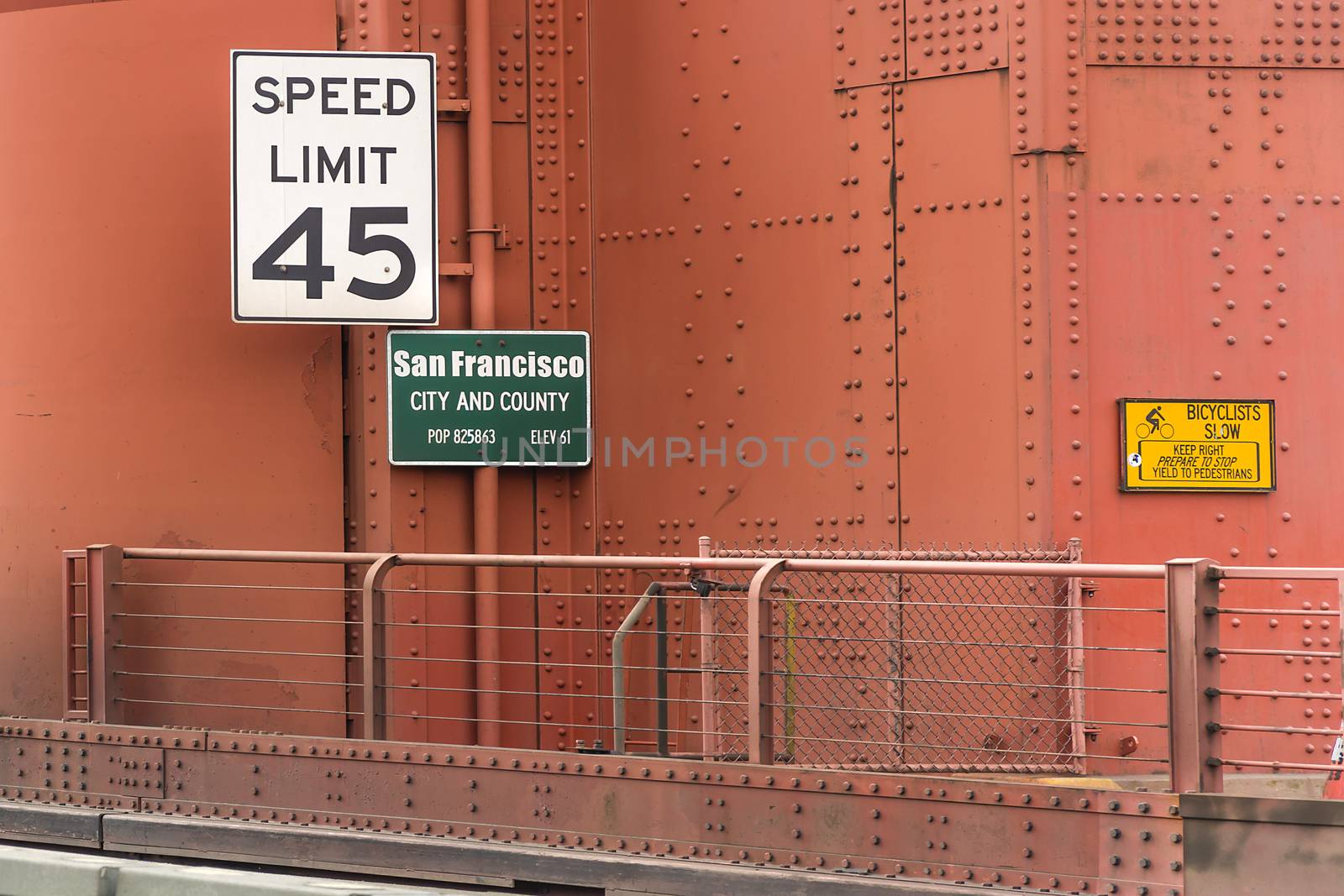 Speed limit and population indication signs on Golden gate Bridge in San Francisco