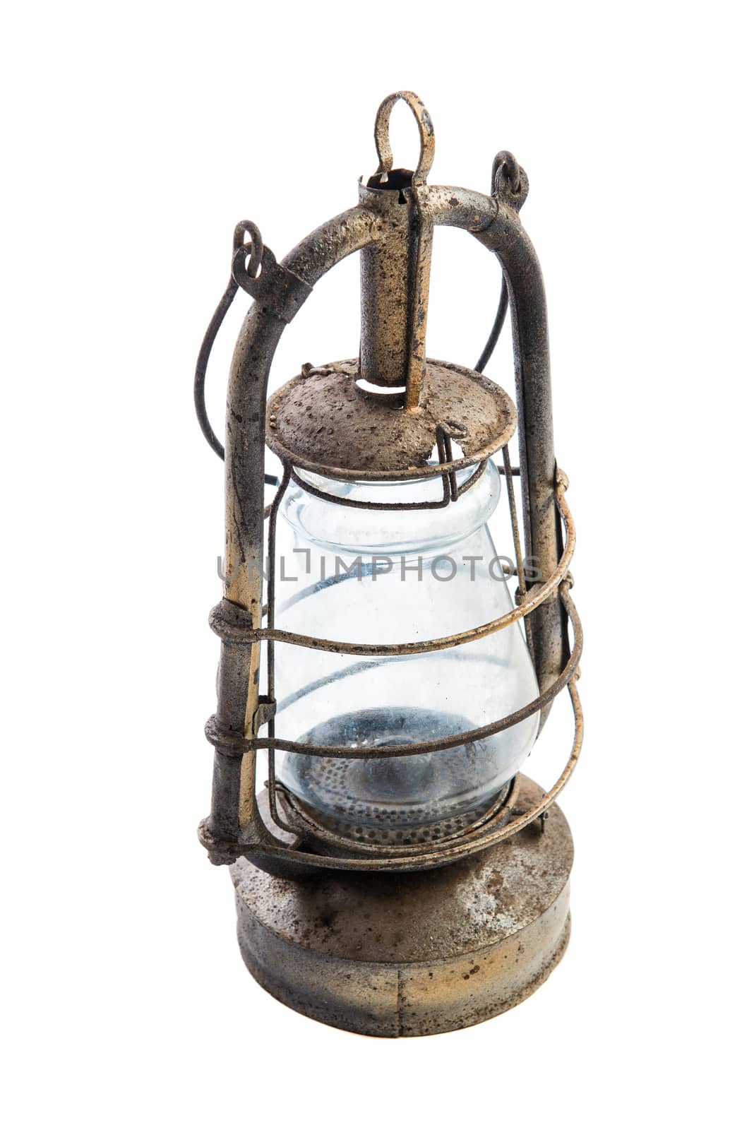 Old classic rustic oil lamp isolated on white background