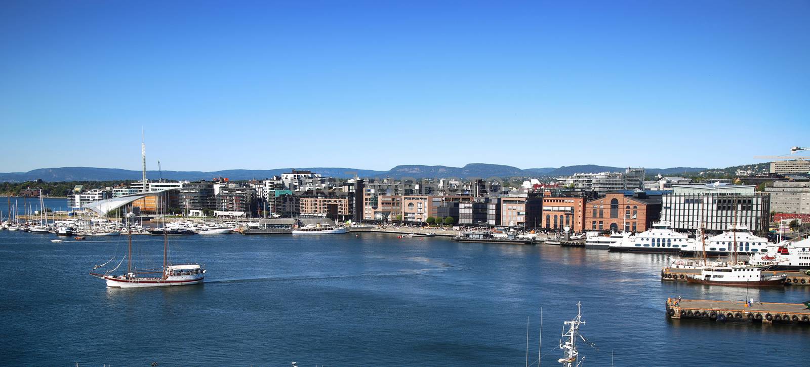 View on modern district Stranden, Aker Brygge district with lux apartments  and restaurants in Oslo, Norway 