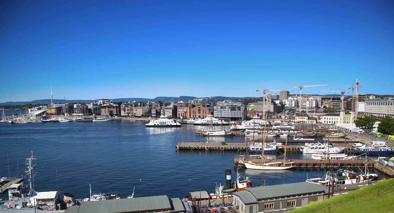 OSLO, NORWAY – AUGUST 17, 2016: View of panorama on Oslo Harbour from Akershus fortress in Oslo, Norway on August 17, 2016.