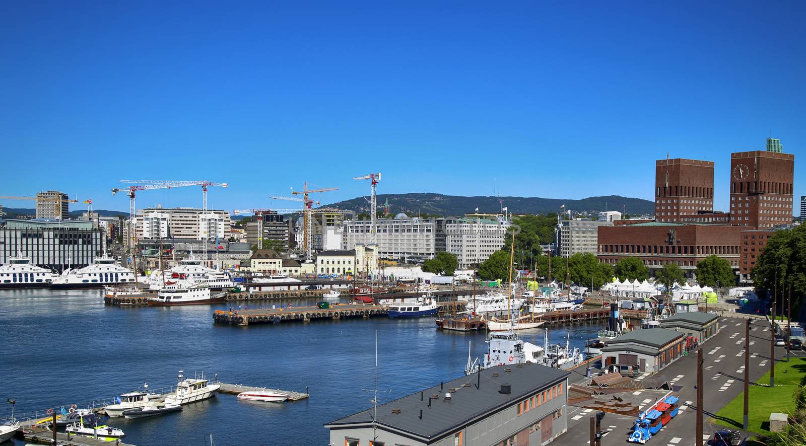 OSLO, NORWAY – AUGUST 17, 2016: View of panorama on Oslo Harbour and Oslo City Hall from Akershus fortress in Oslo, Norway on August 17, 2016.
