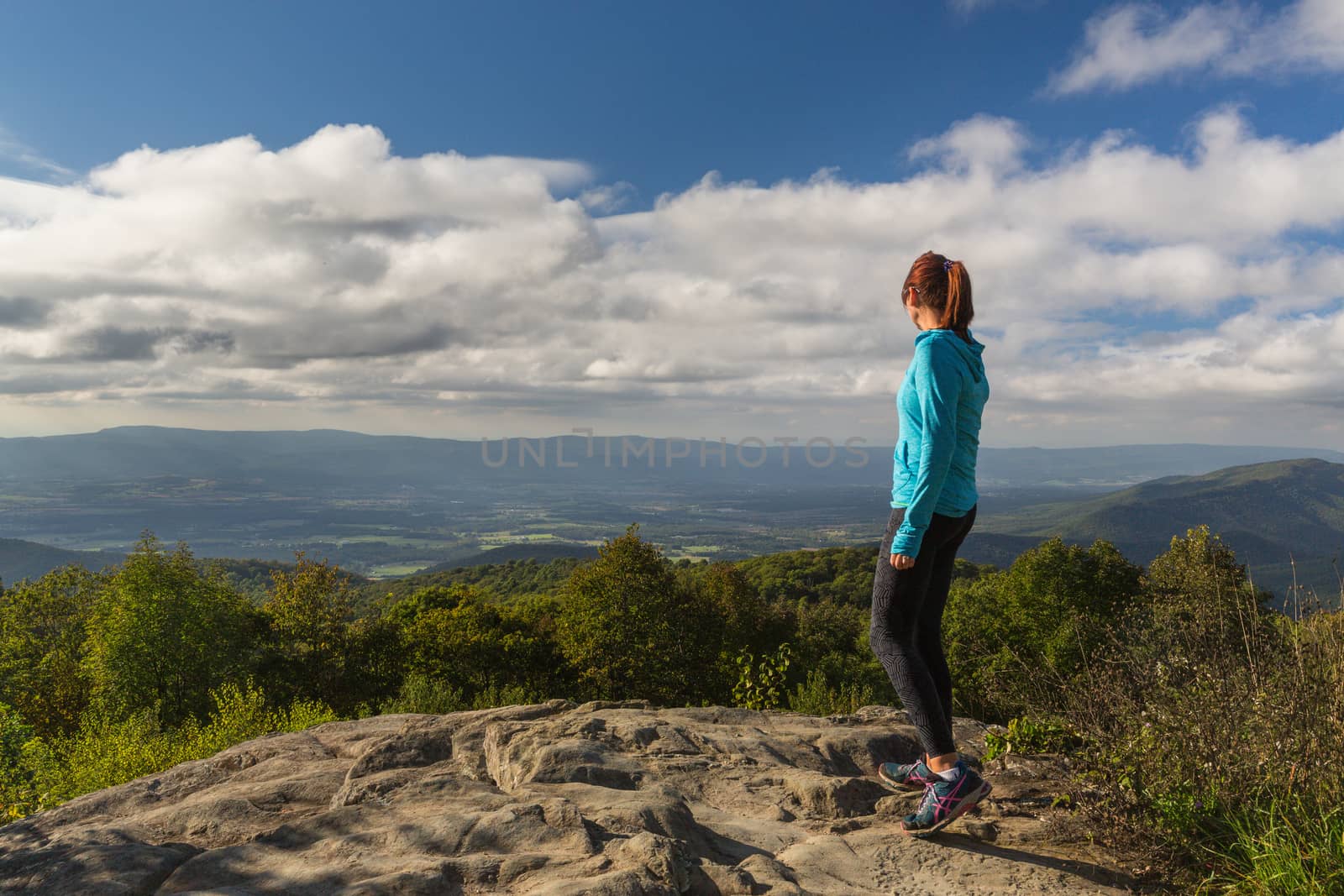 Woman over looking the Blue Ridge Mountains by chrisukphoto