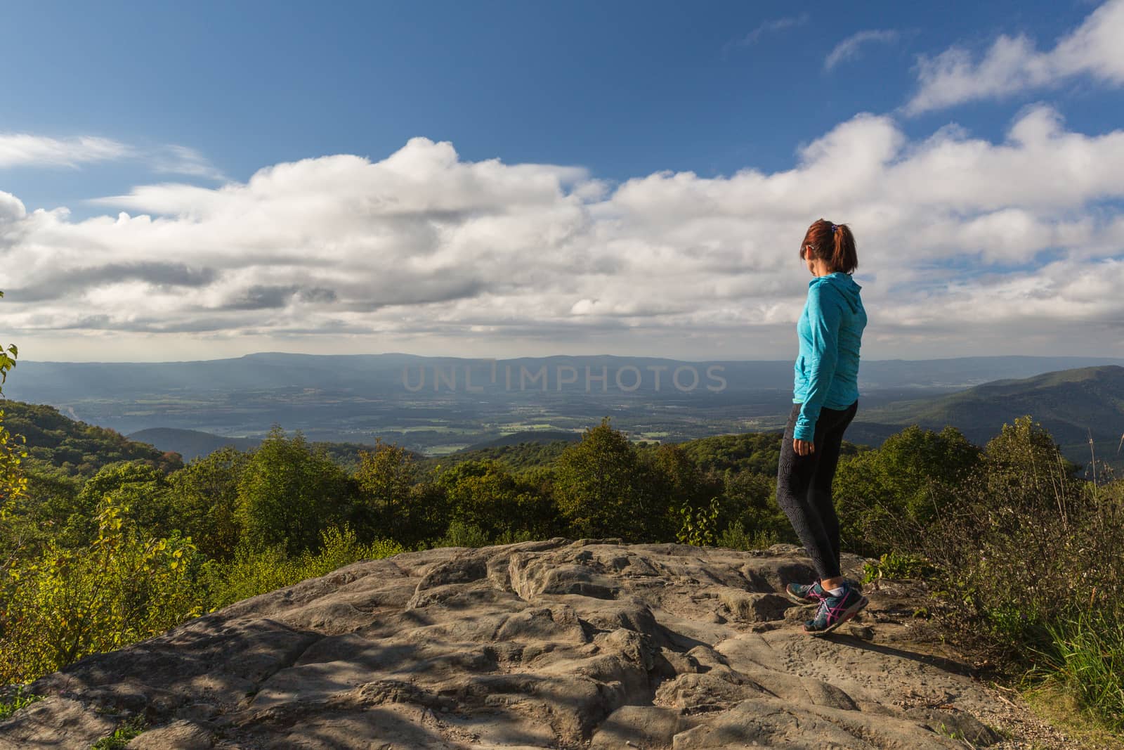 woman over looking the Blue Ridge Mountains by chrisukphoto