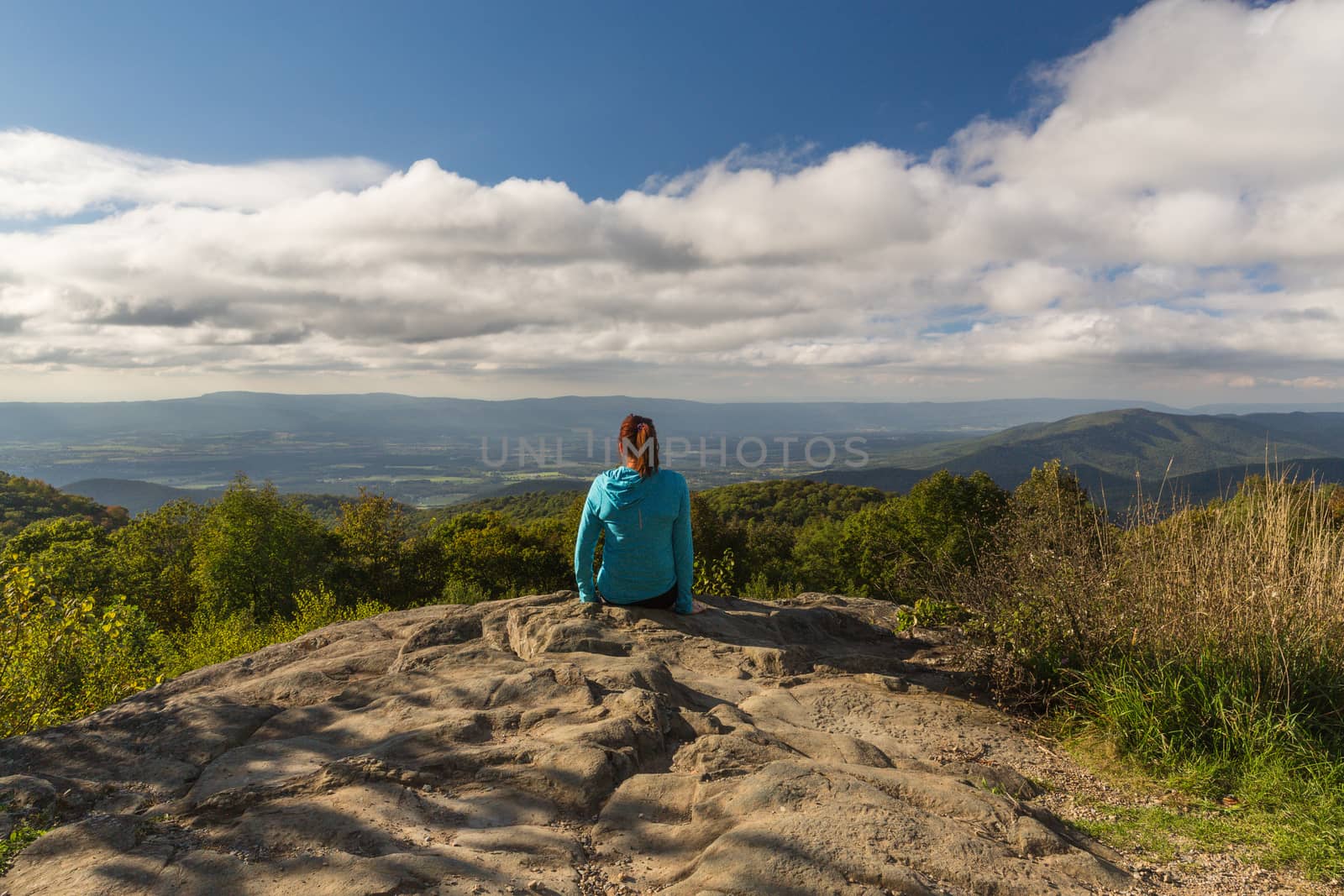 woman over looking the Blue Ridge Mountains by chrisukphoto
