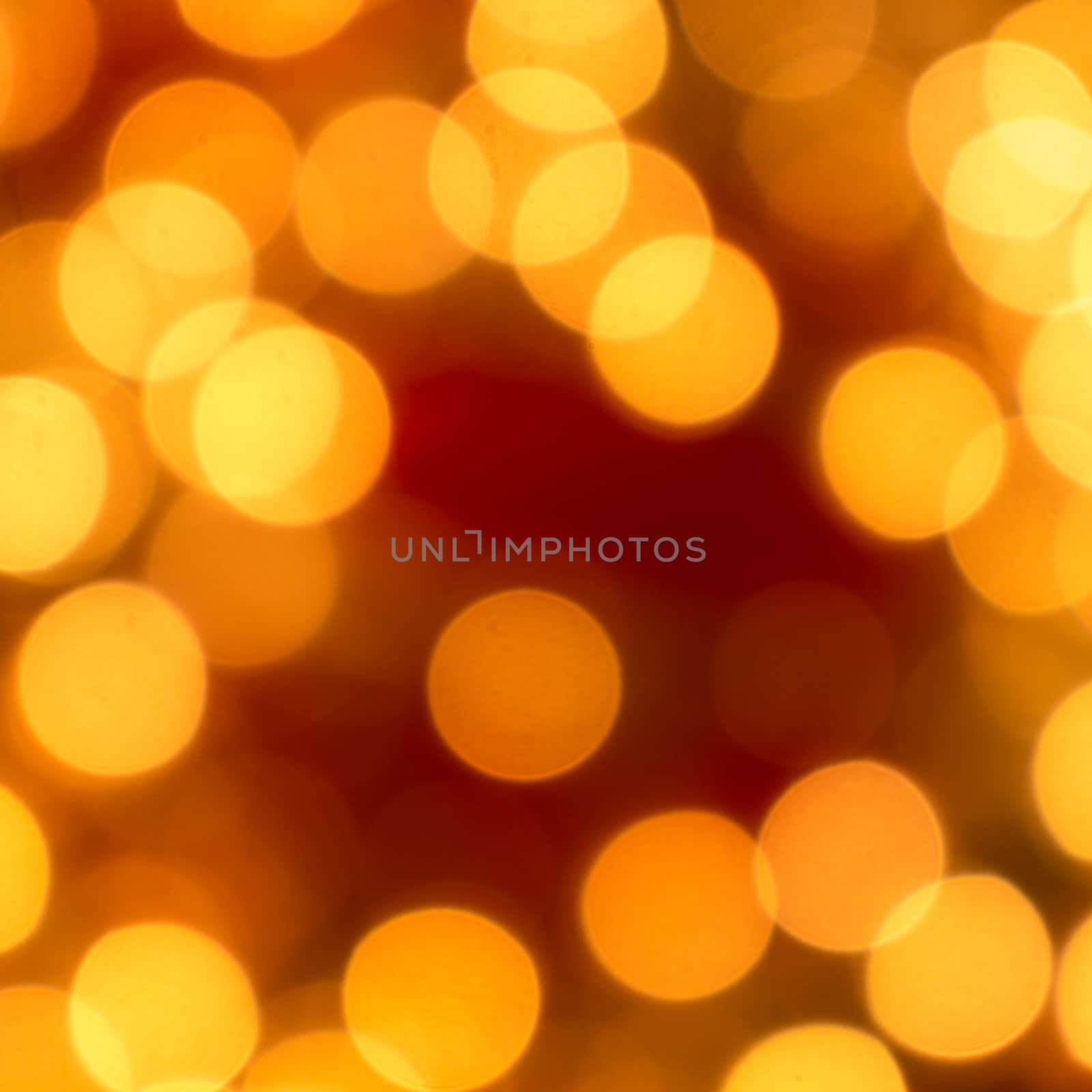 Christmas lights gold blurred lights on red background. Square shape