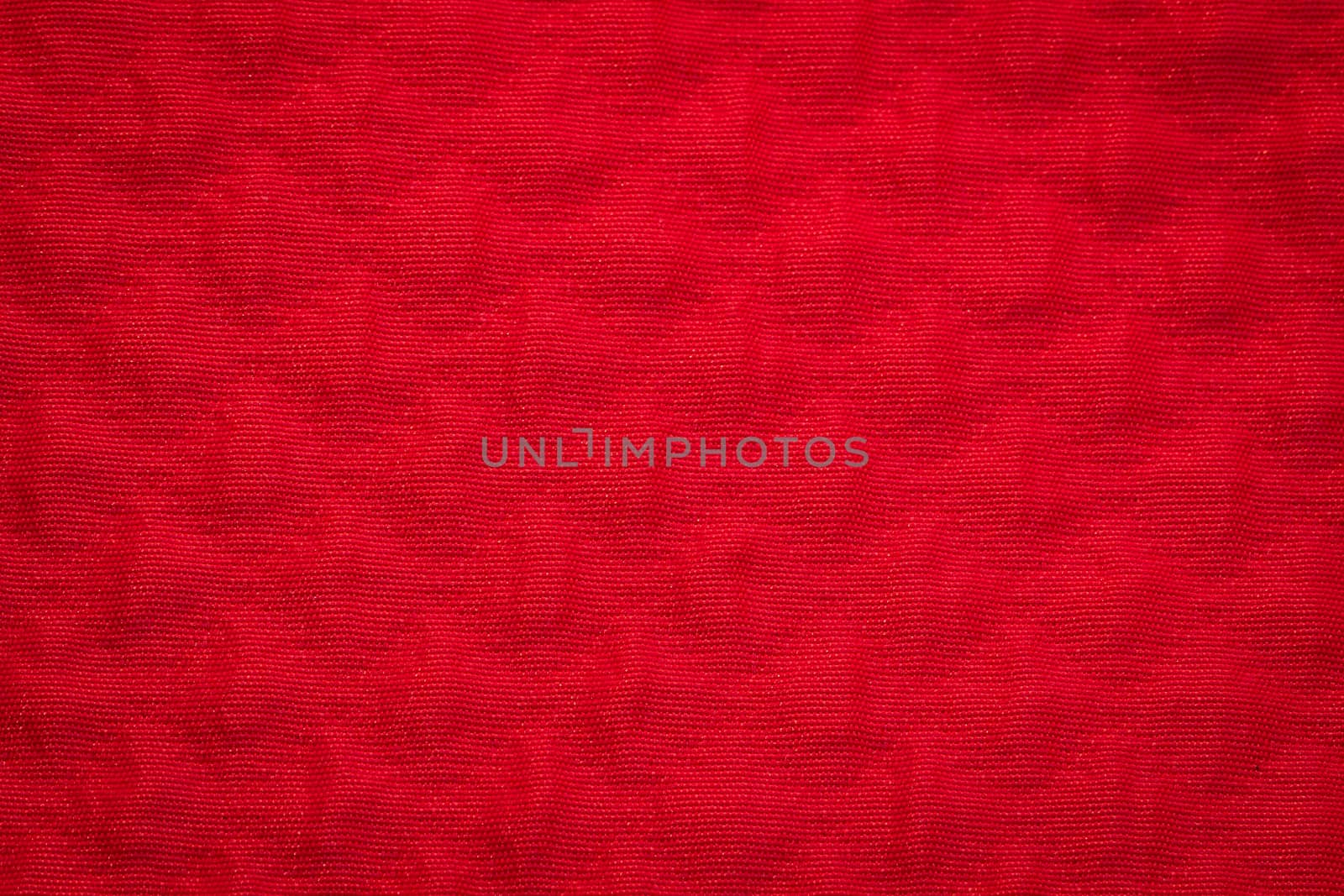 Rustic canvas fabric texture in red color.