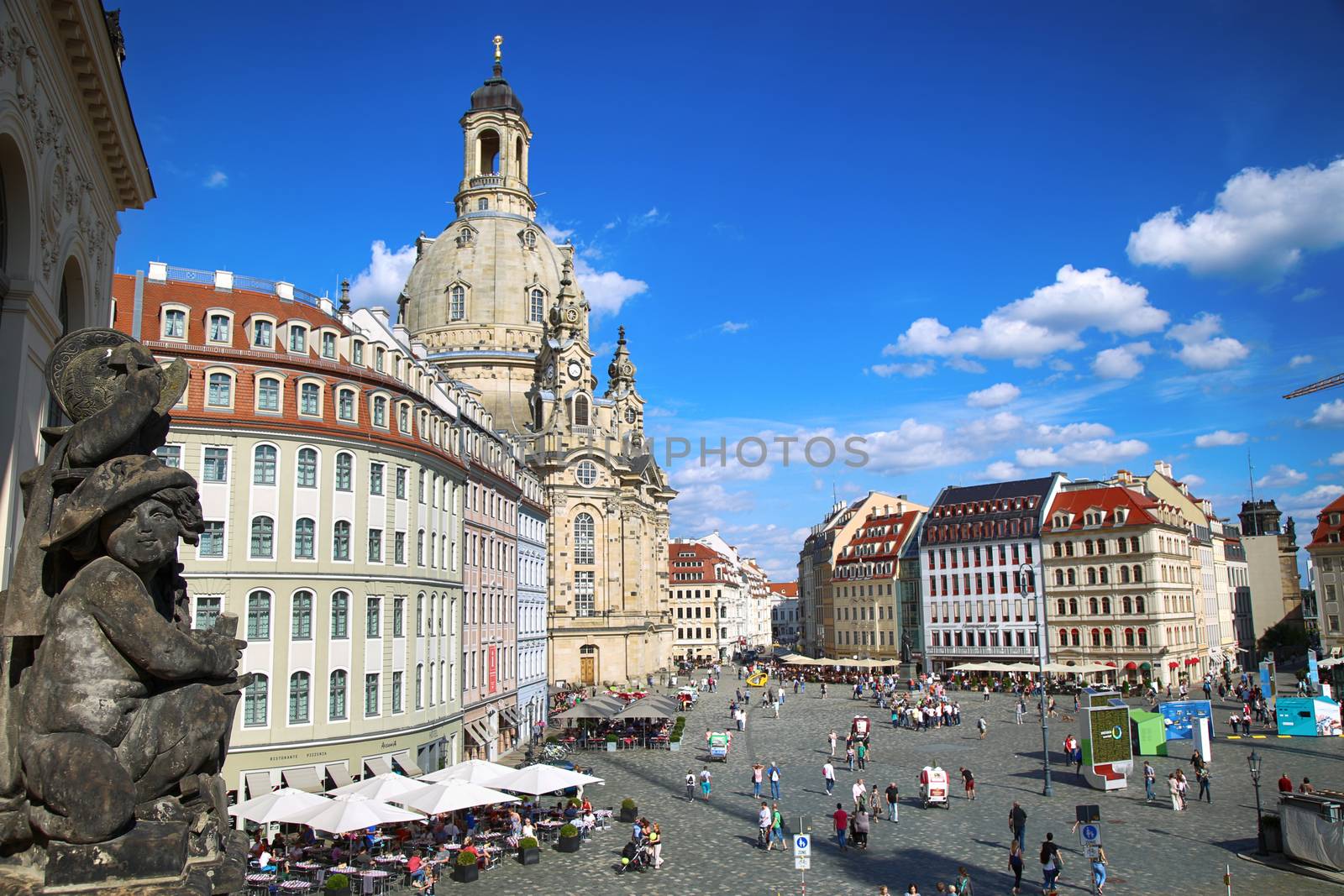 DRESDEN, GERMANY – AUGUST 13, 2016: People walk on Neumarkt Square at Frauenkirche (Our Lady church) in the center of Old town in Dresden, State of Saxony, Germany on August 13, 2016.