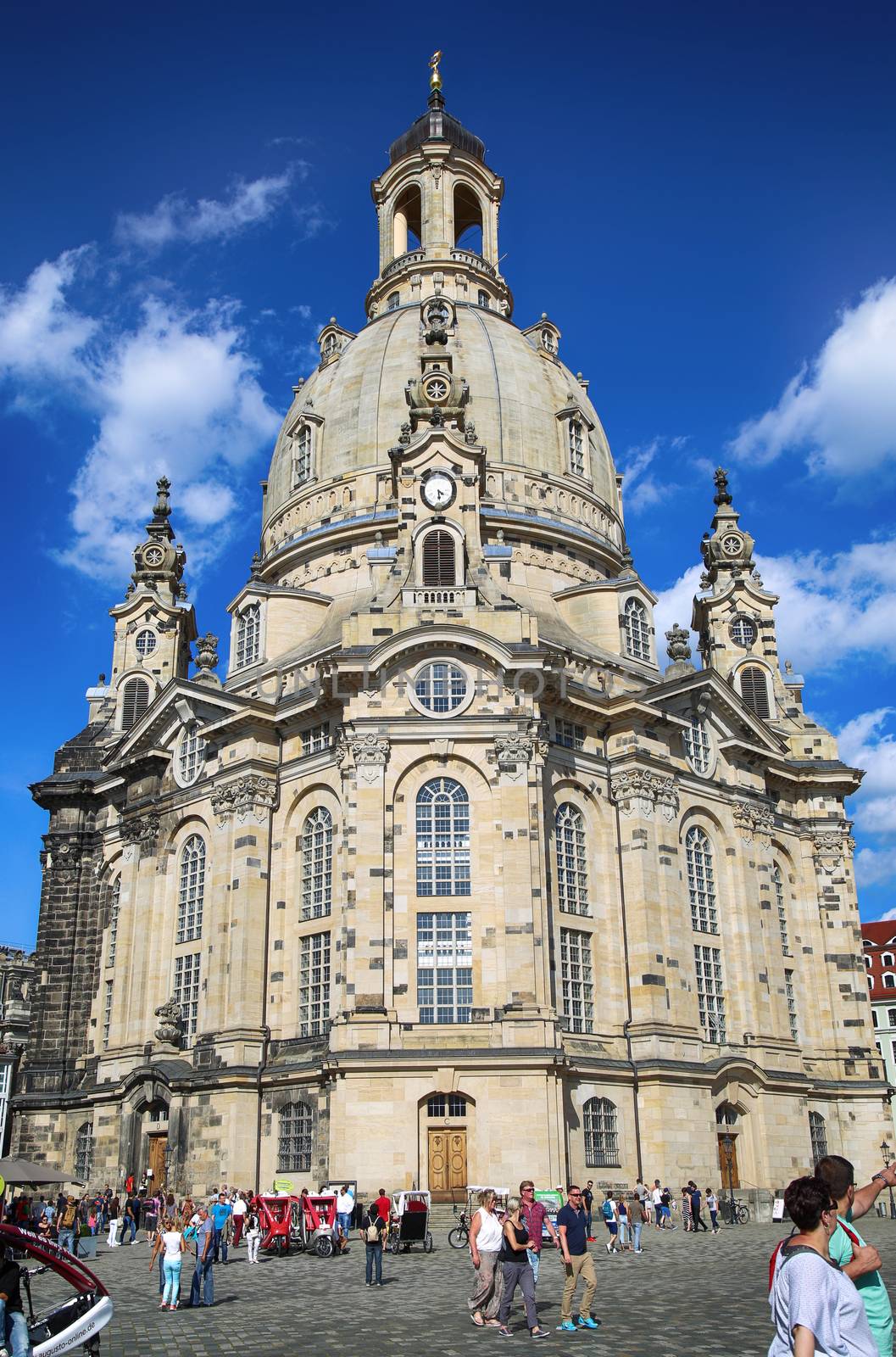 DRESDEN, GERMANY – AUGUST 13, 2016: People walk on Neumarkt Square at Frauenkirche (Our Lady church) in the center of Old town in Dresden, State of Saxony, Germany on August 13, 2016.