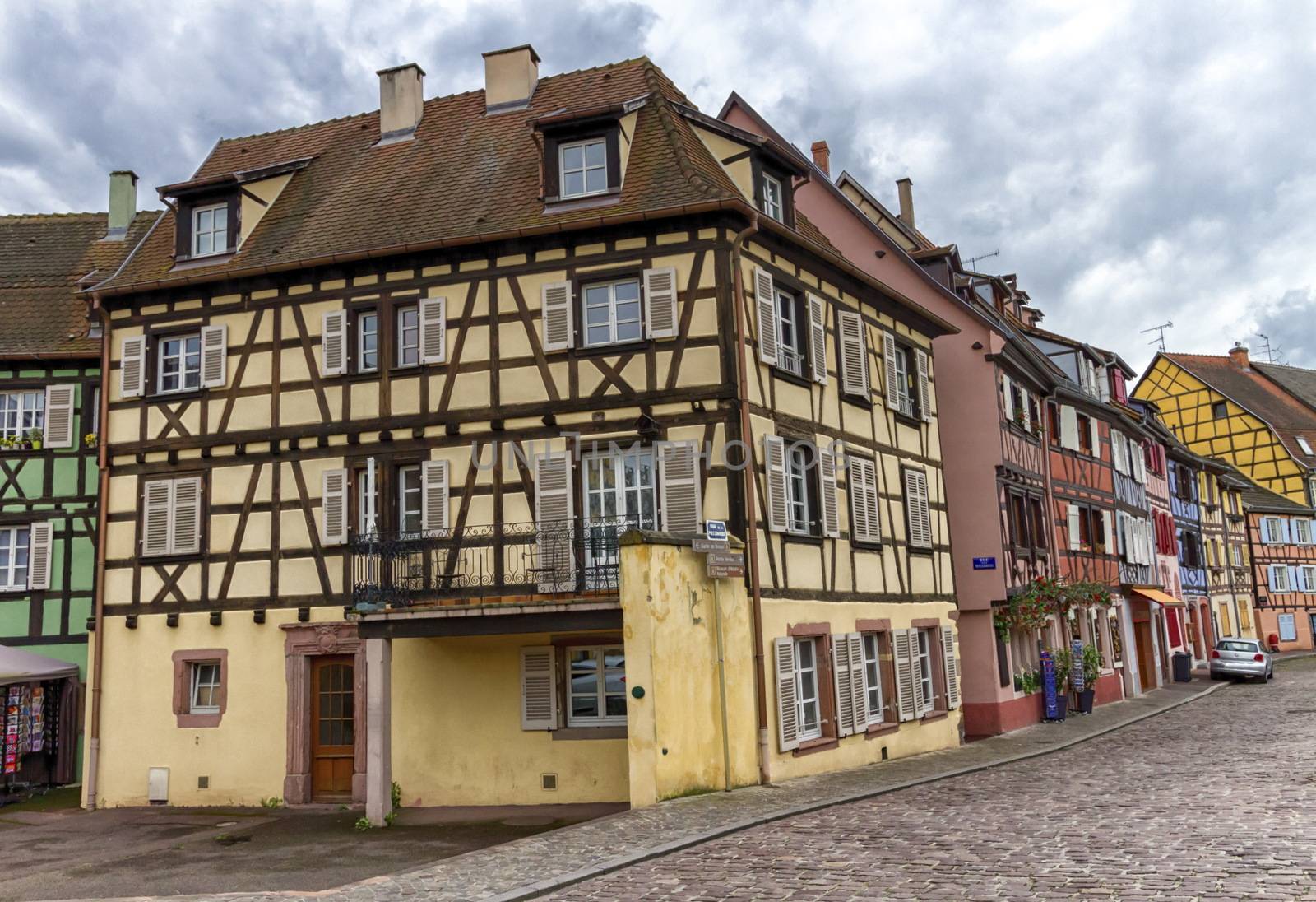 Traditional half-timbered houses in Colmar, Alsace, France by Elenaphotos21