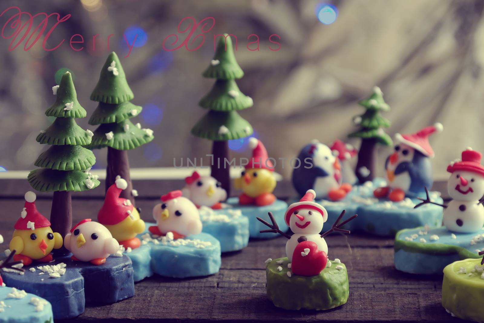 Merry Christmas background and happy new year from abstract handmade art, snowman, owl, bird, christmas tree diy from clay material, wonderful craft to make Xmas ornament for decor in winter holiday