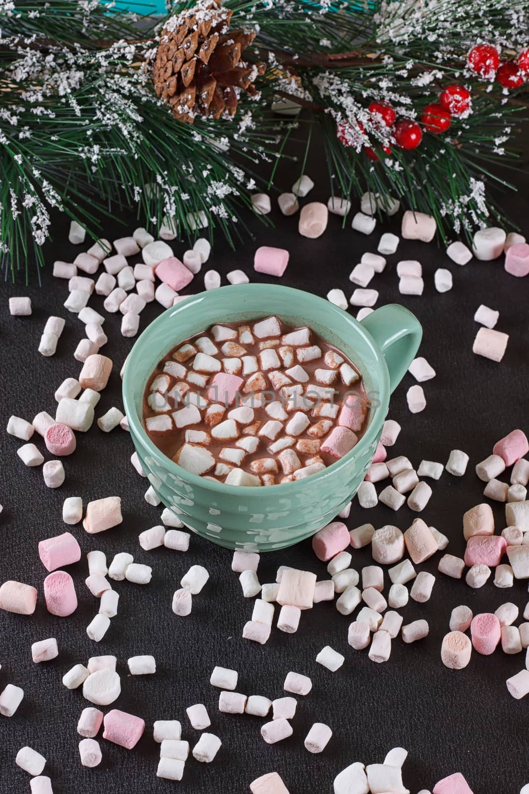 mug with hot chocolate and burning lantern on wooden table