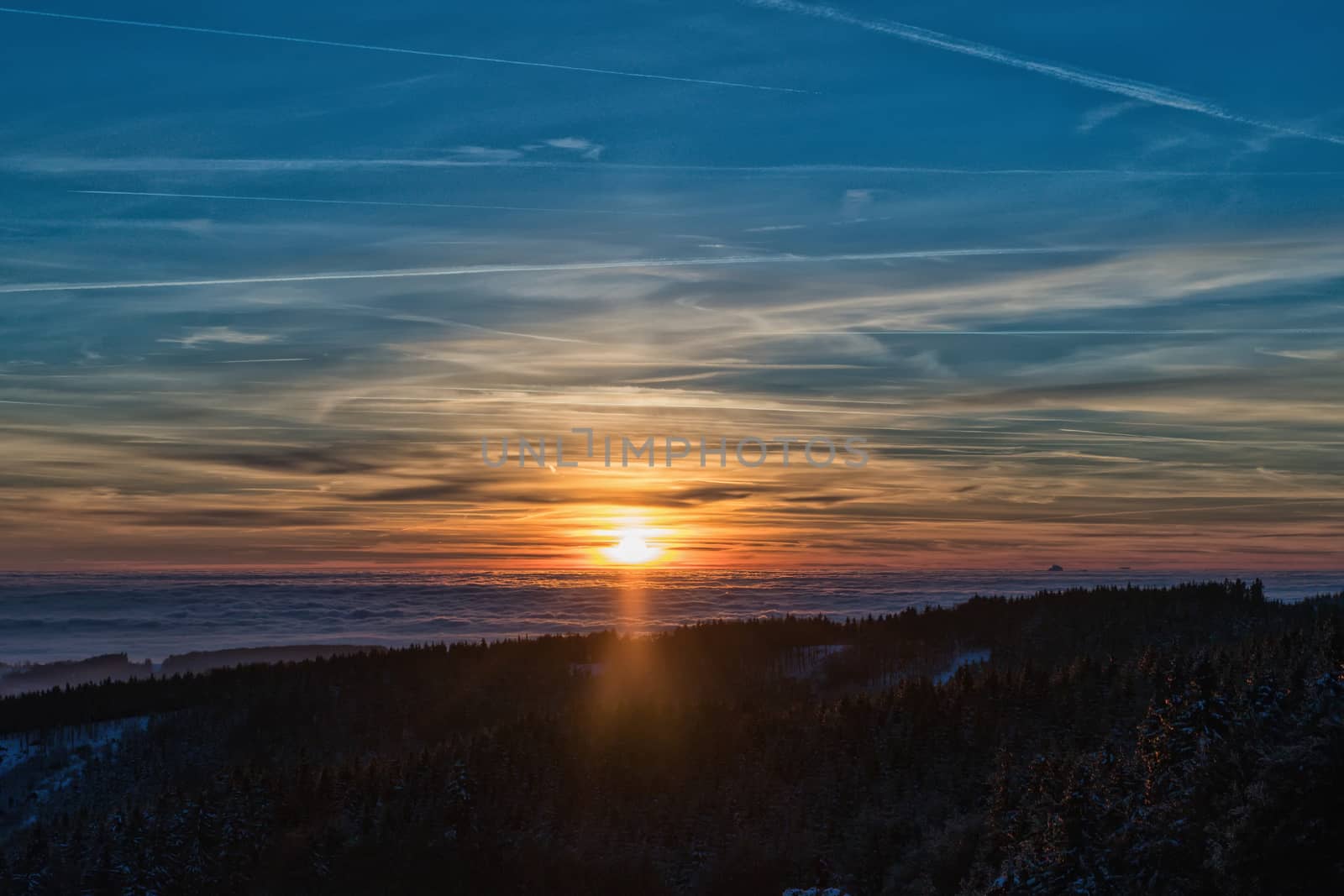 Amazing evening with sunset in Eagle mountains. Beautiful mountain within inversion