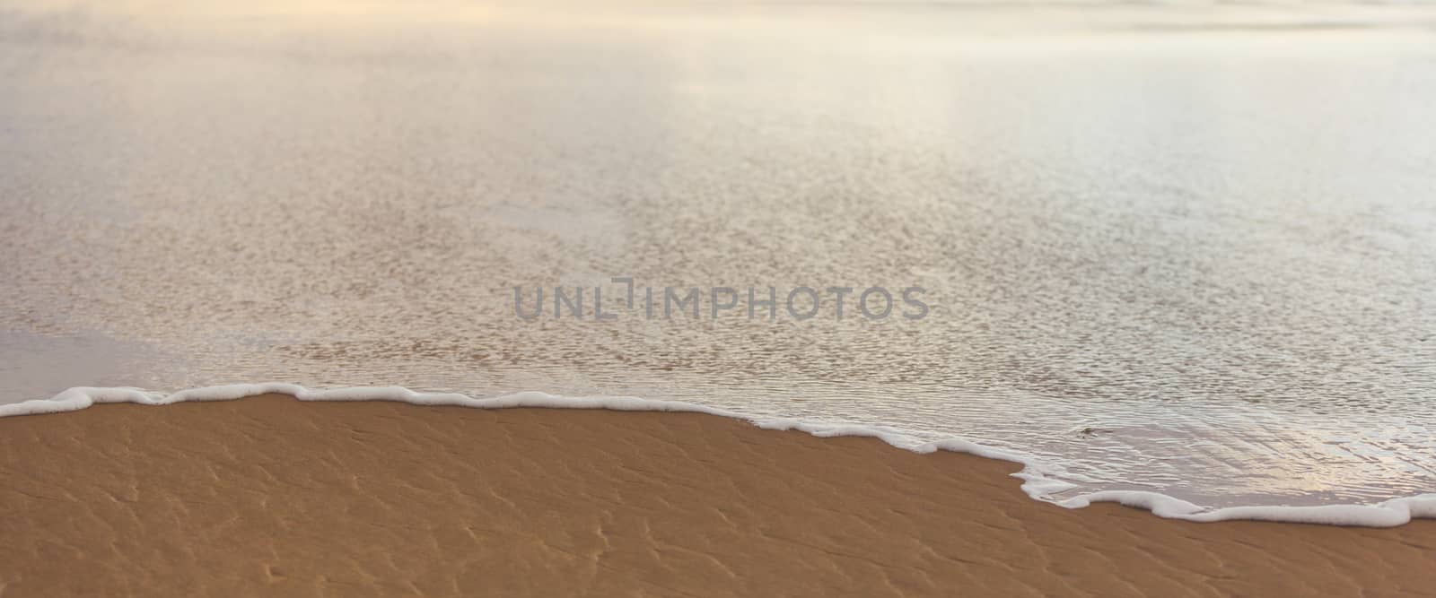 the landscape sea waves close-up on sand