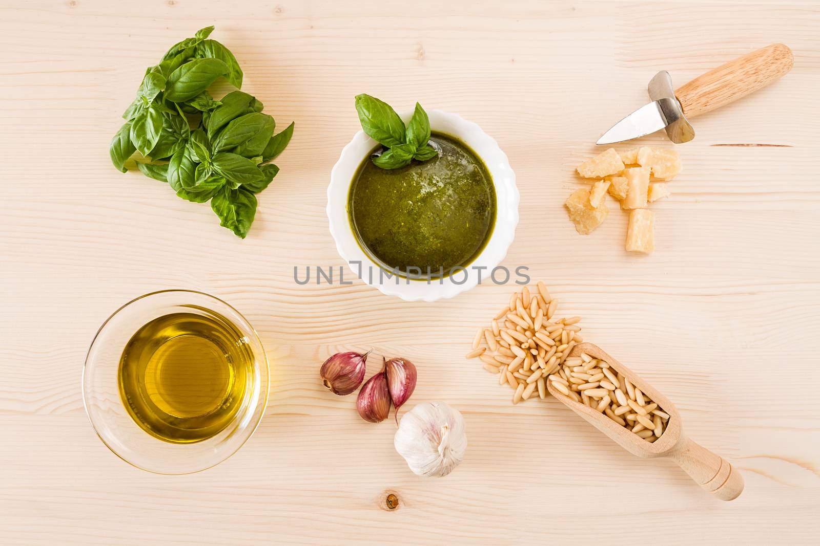 Pesto genovese sauce with its ingredients seen from above