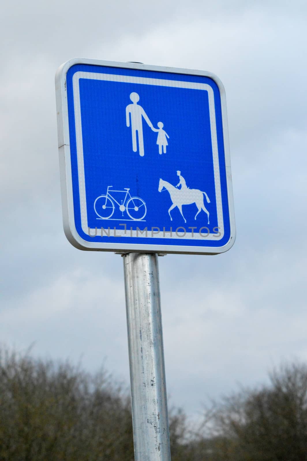Rectangular road sign for pedestrian access, cyclist and horseback riding.
