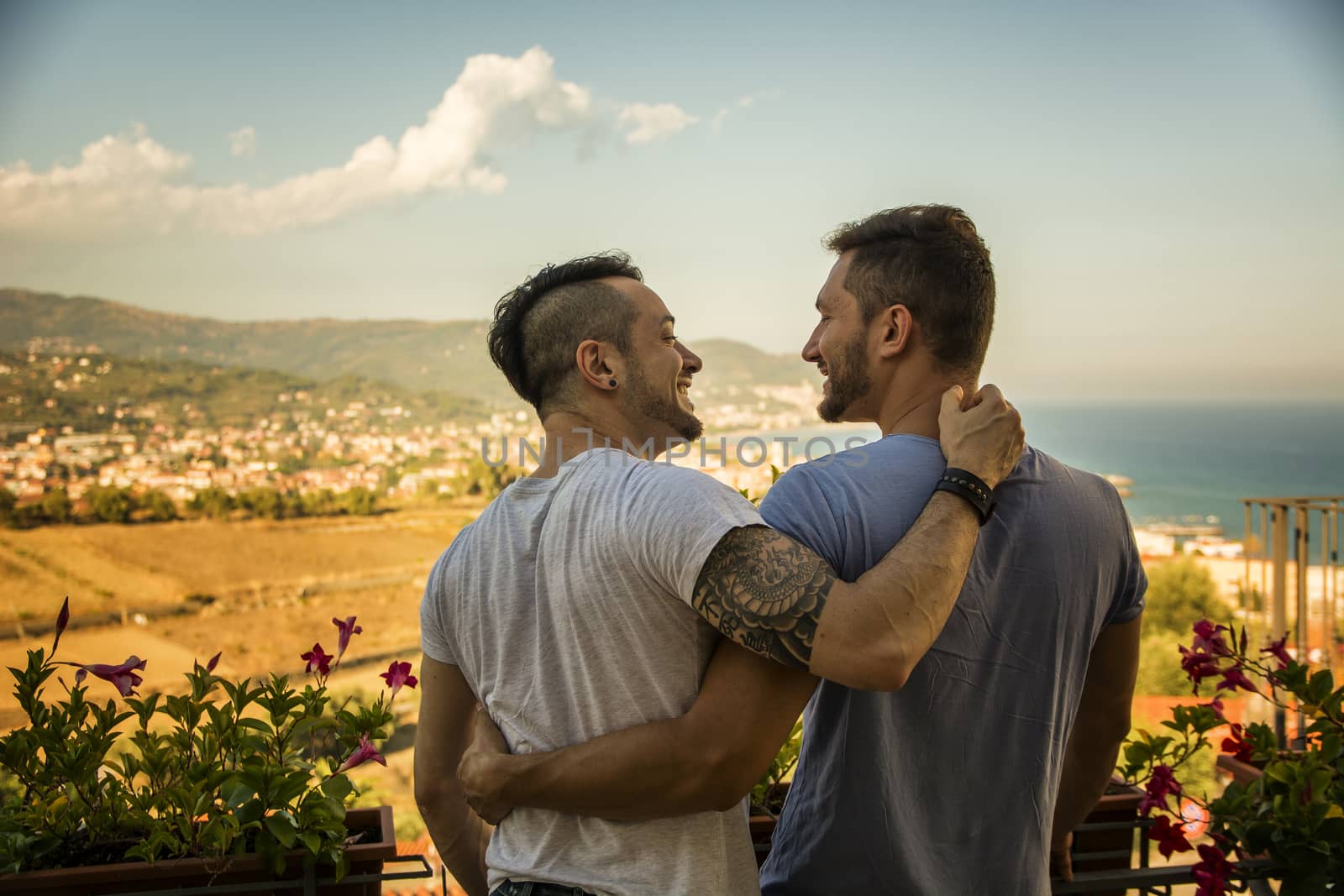 Back view of two gays embracing by artofphoto