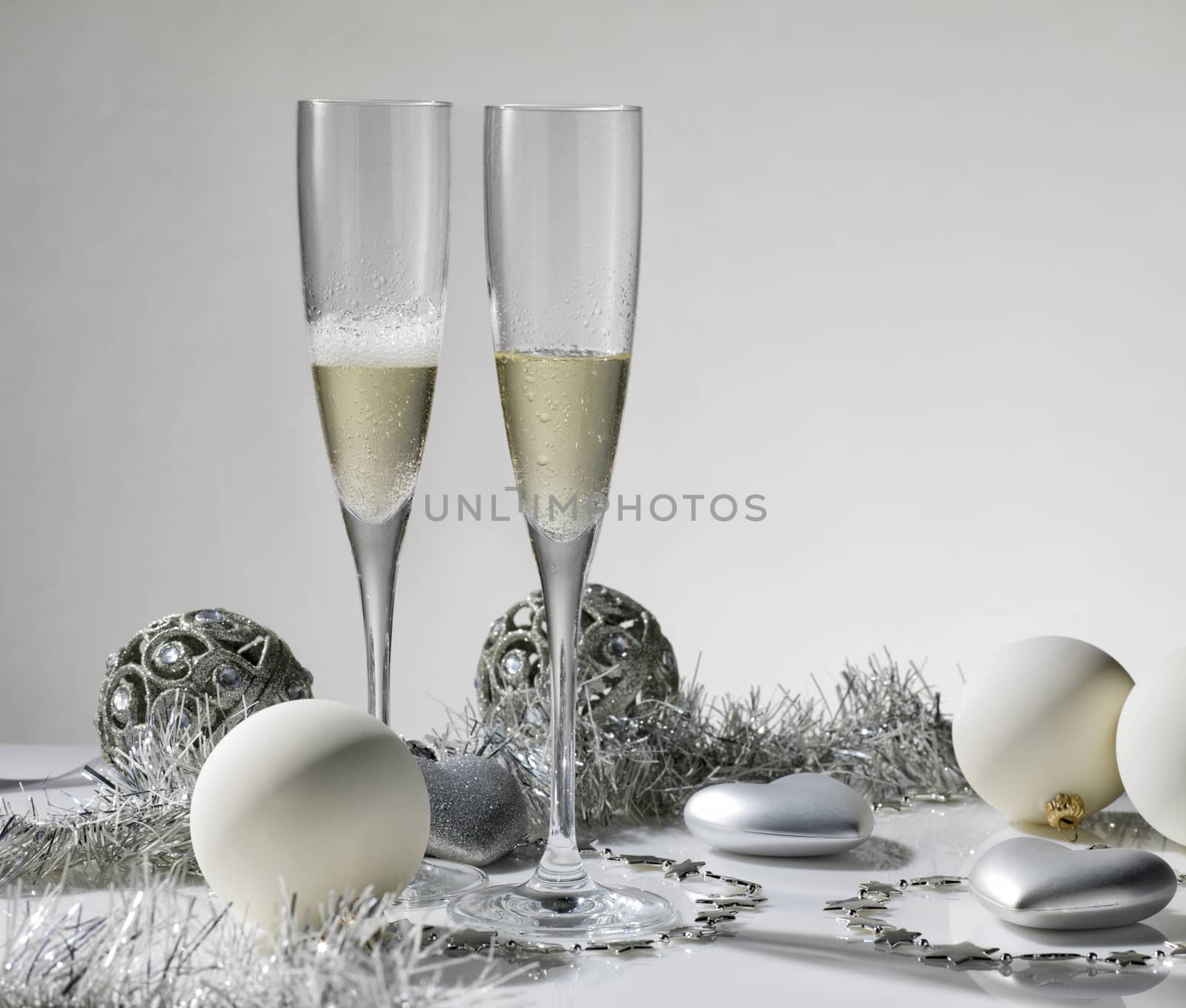 Champagne glasses ready to bring in the New Year by janssenkruseproductions