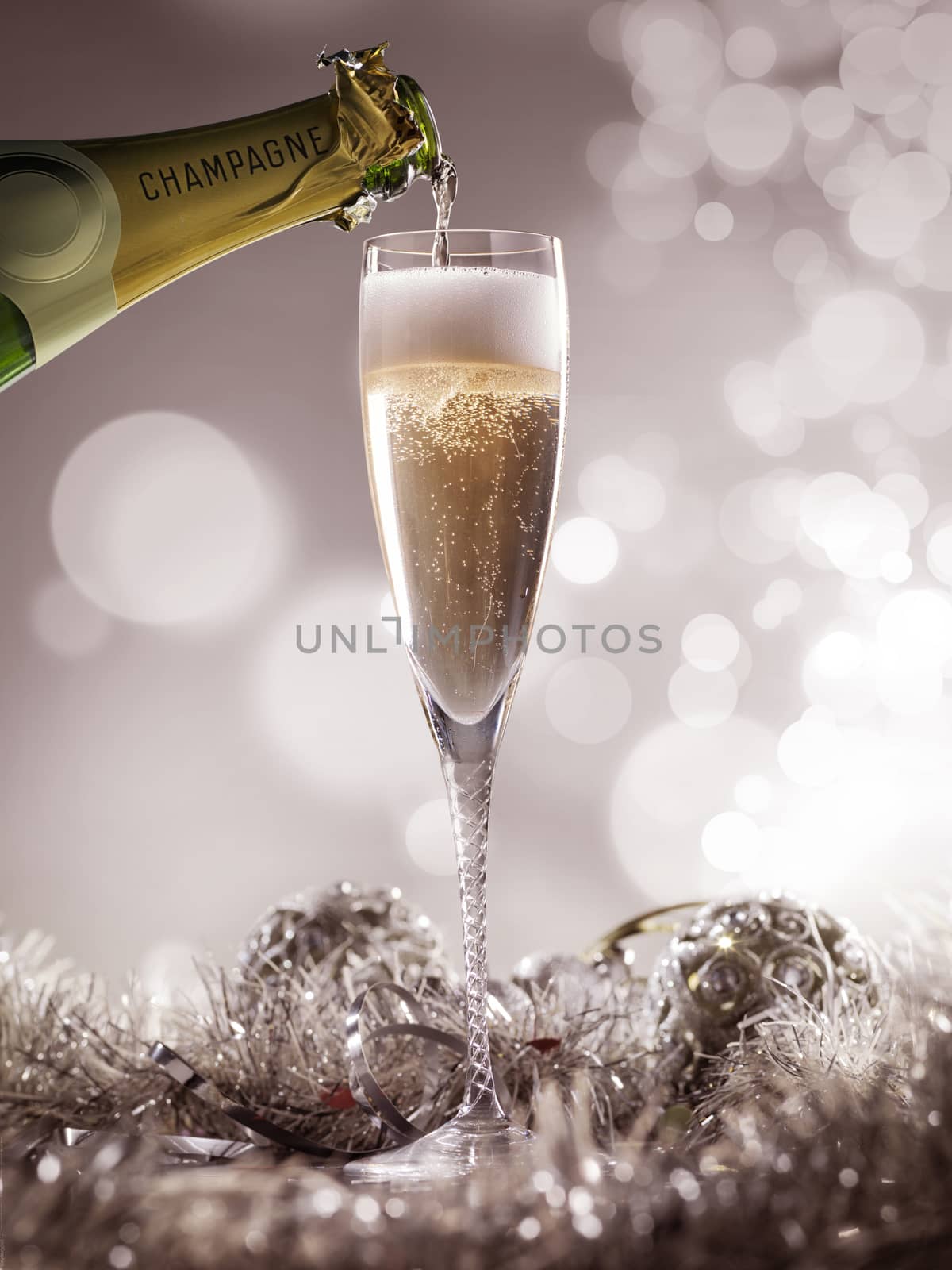 Crystal luxury champagne glass with champagne bottle and decorat by janssenkruseproductions