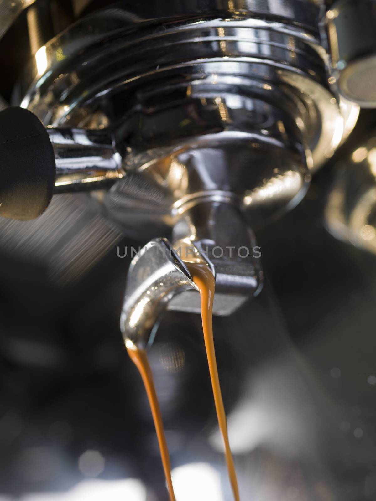 Close up espresso machine brewing a coffee espresso
