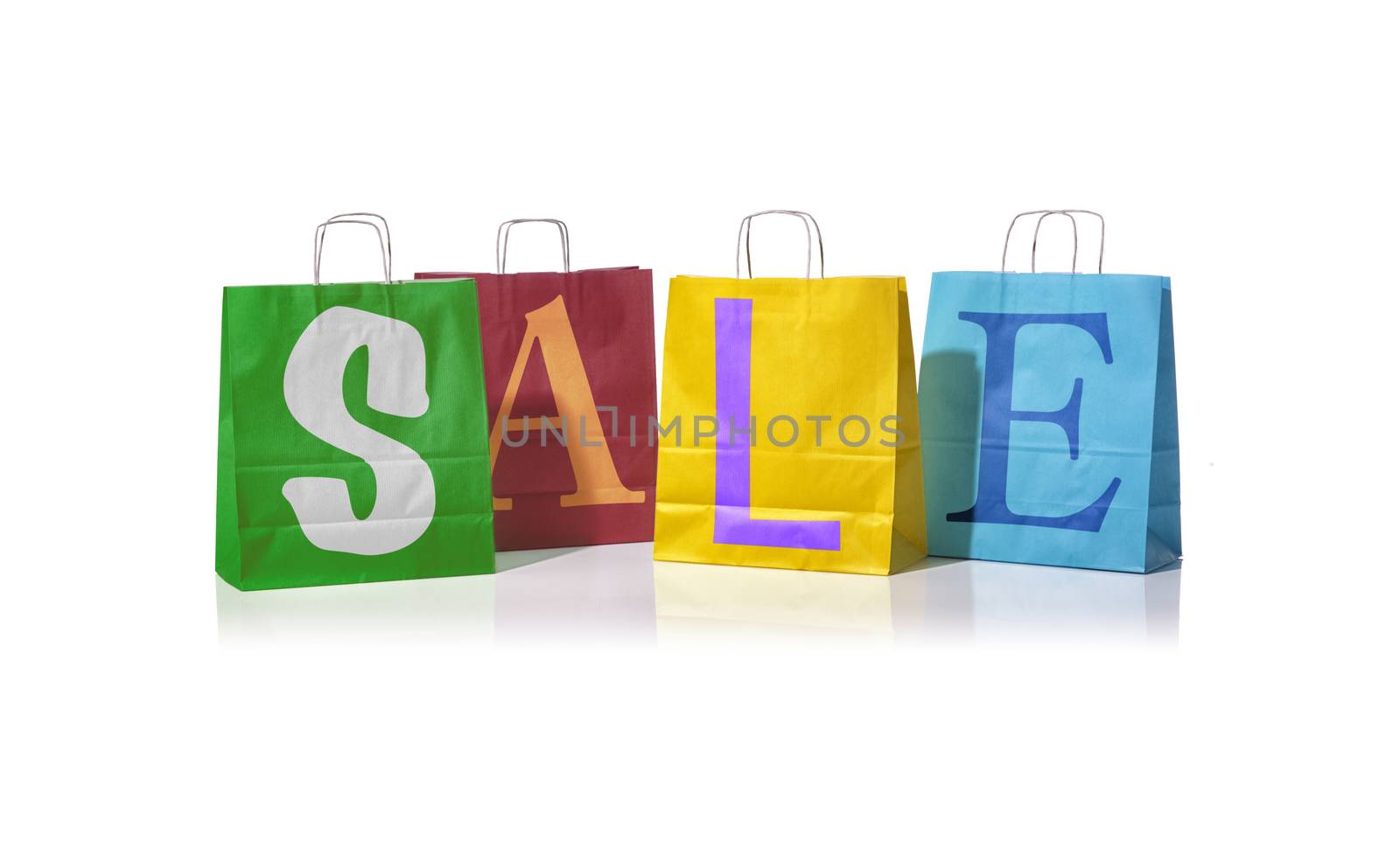 Shopping bags with the word sale on them by janssenkruseproductions