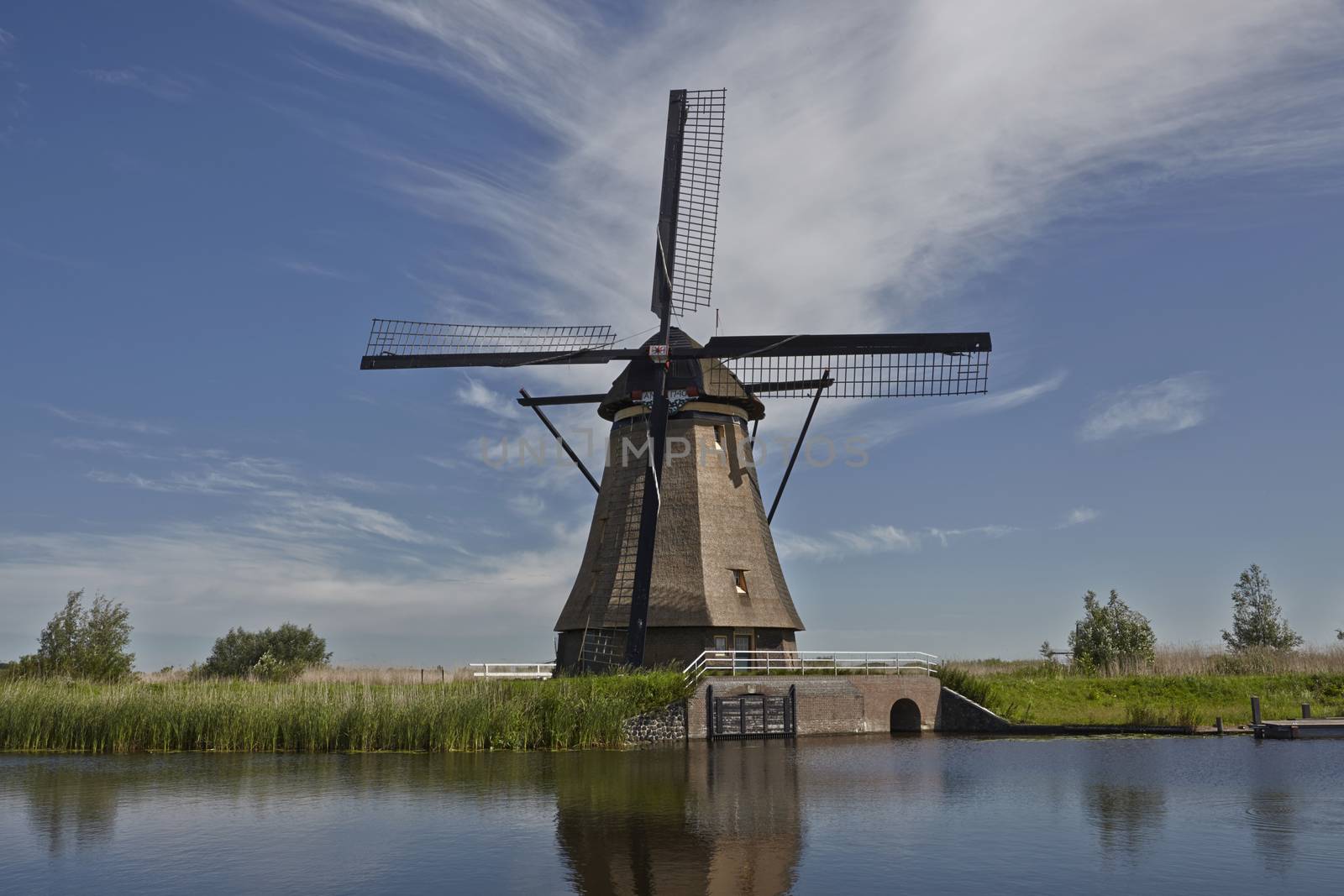 Stone brick windmill in kinderdijk. The Netherlands by janssenkruseproductions