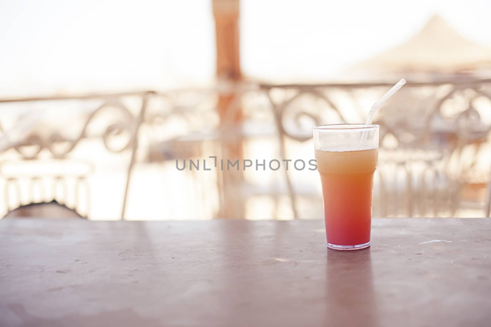 Cocktail glasses with tube on the table