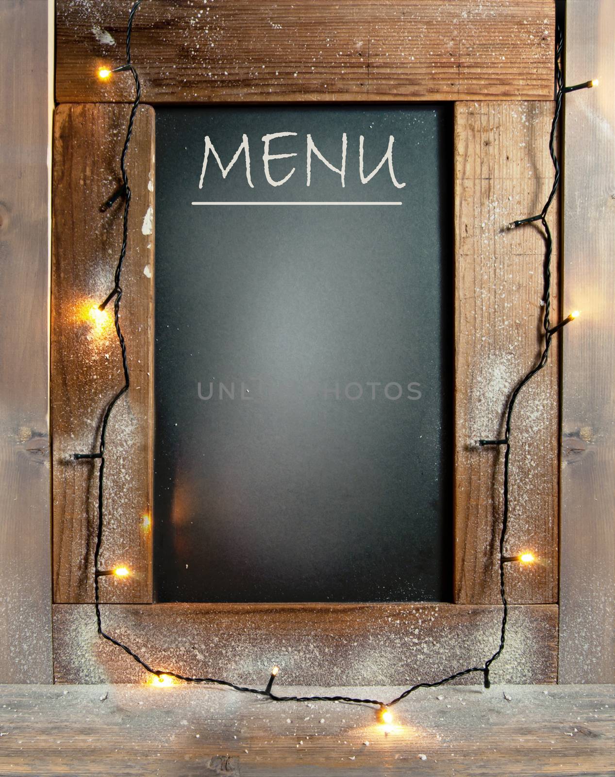 Empty menu board with decorative lights