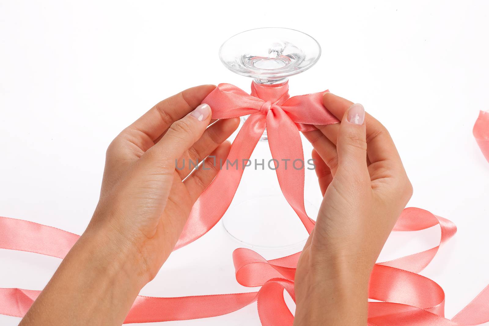 Woman's hand and band on a glasses
