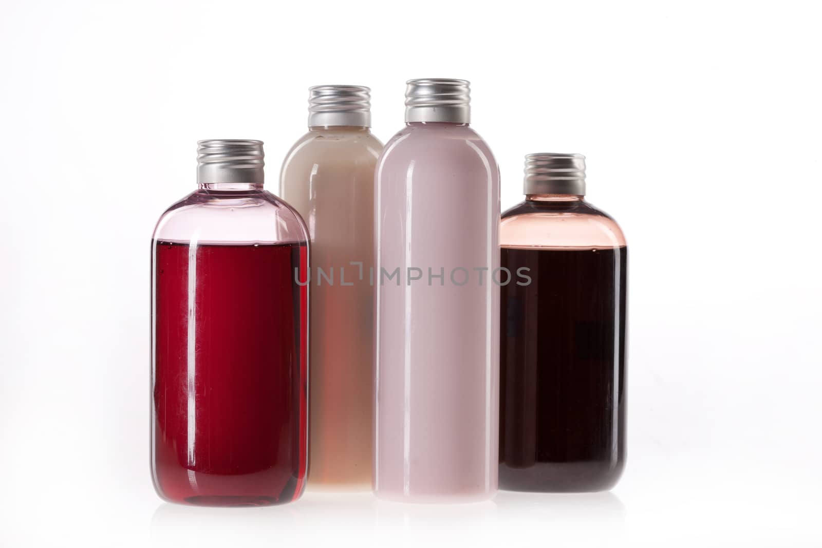 Bottles with multicolored on an isolated background