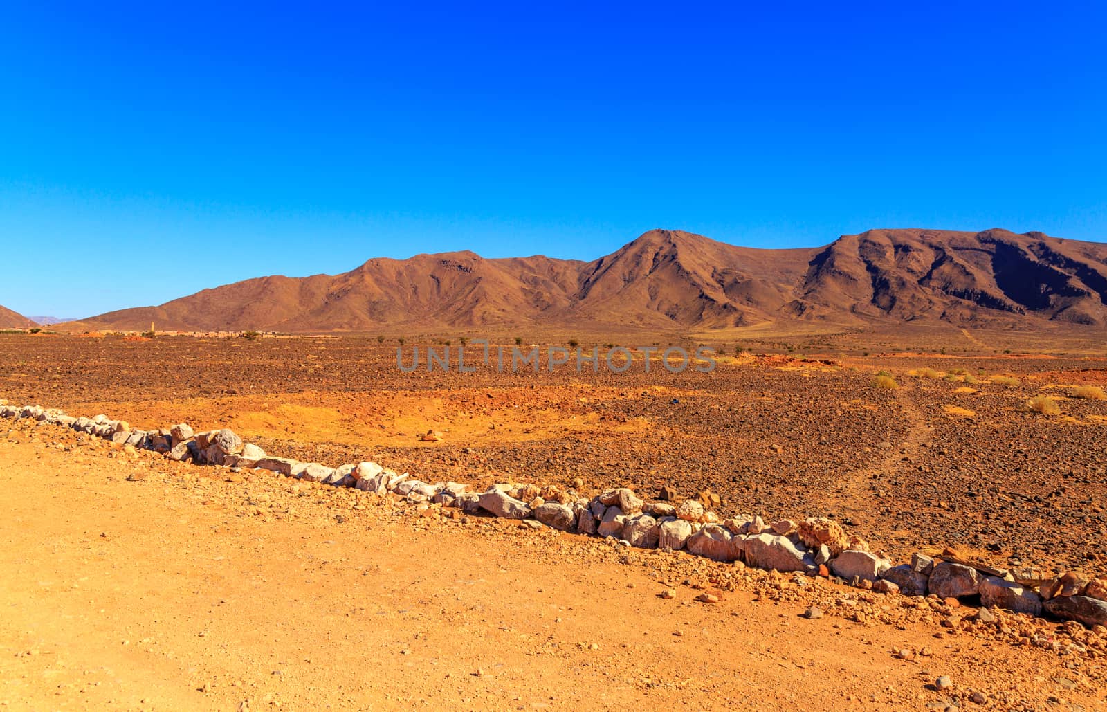 Beautiful Moroccan landscape, Sahara desert, stones against the sky