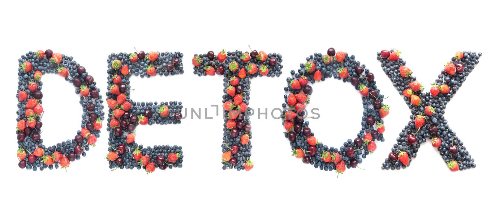 Detox word made from berries  by unikpix