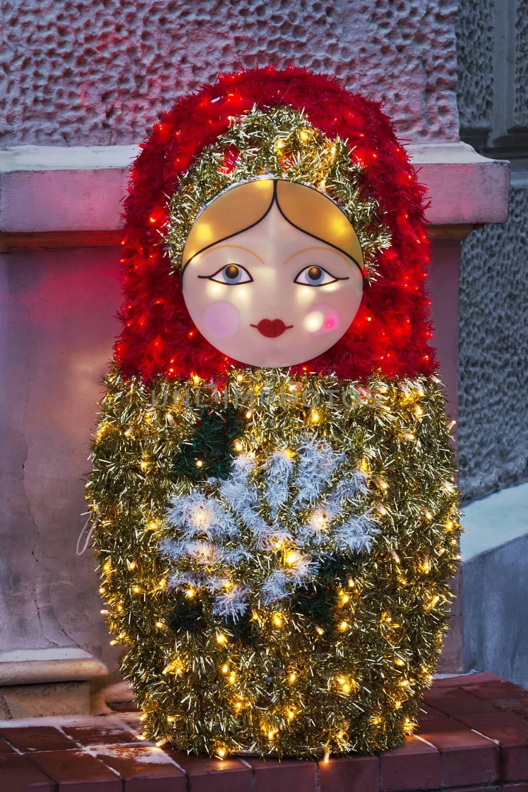 Christmas decoration in the city, doll in the lighting. by Gaina