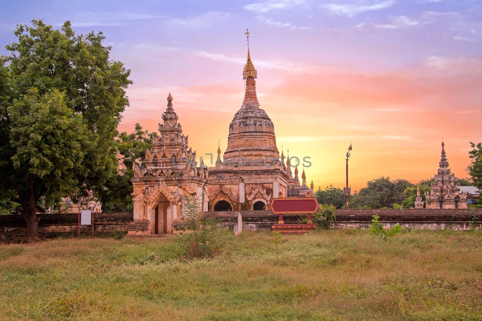 Ancient pagodas in the landscape from Bagan in Myanmar at sunset