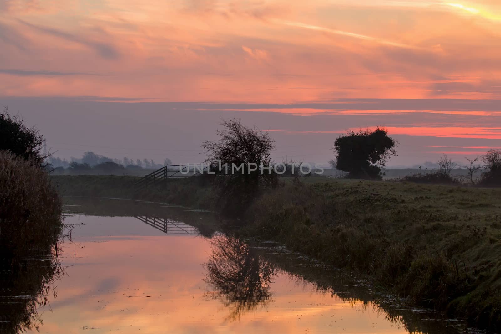 December dawn breaking over Pevensey Levels in East Sussex, England